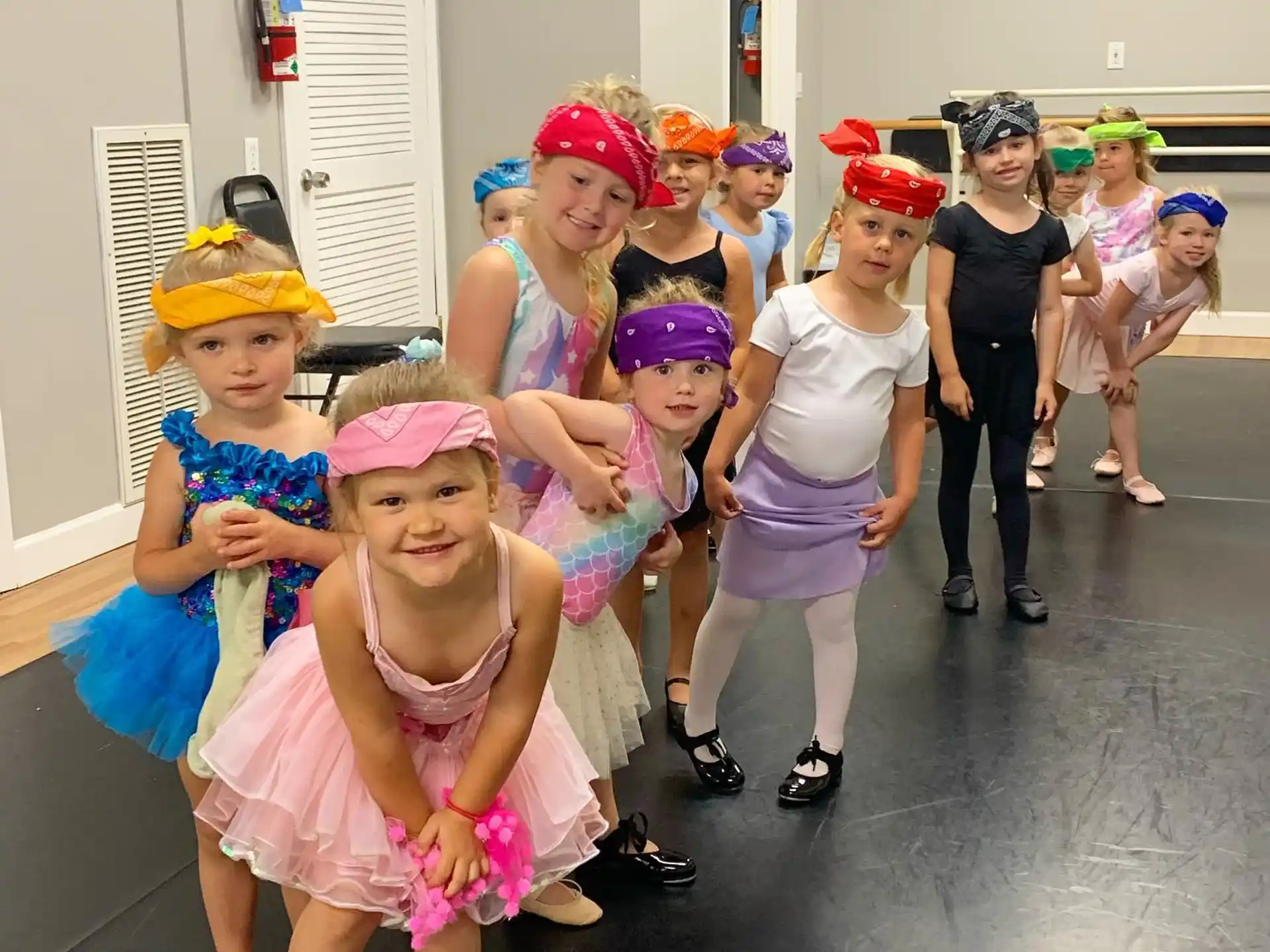 a group of children wearing clothing