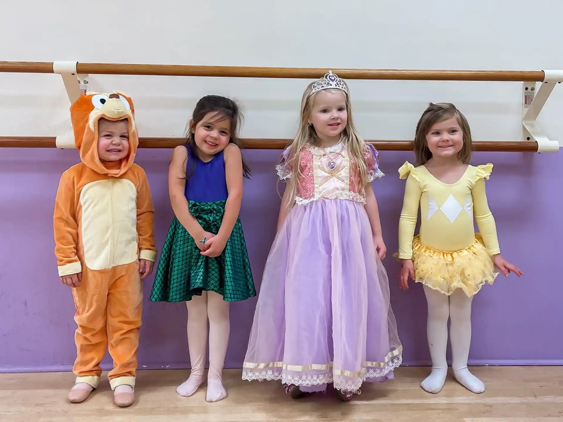 a group of children posing for a photo