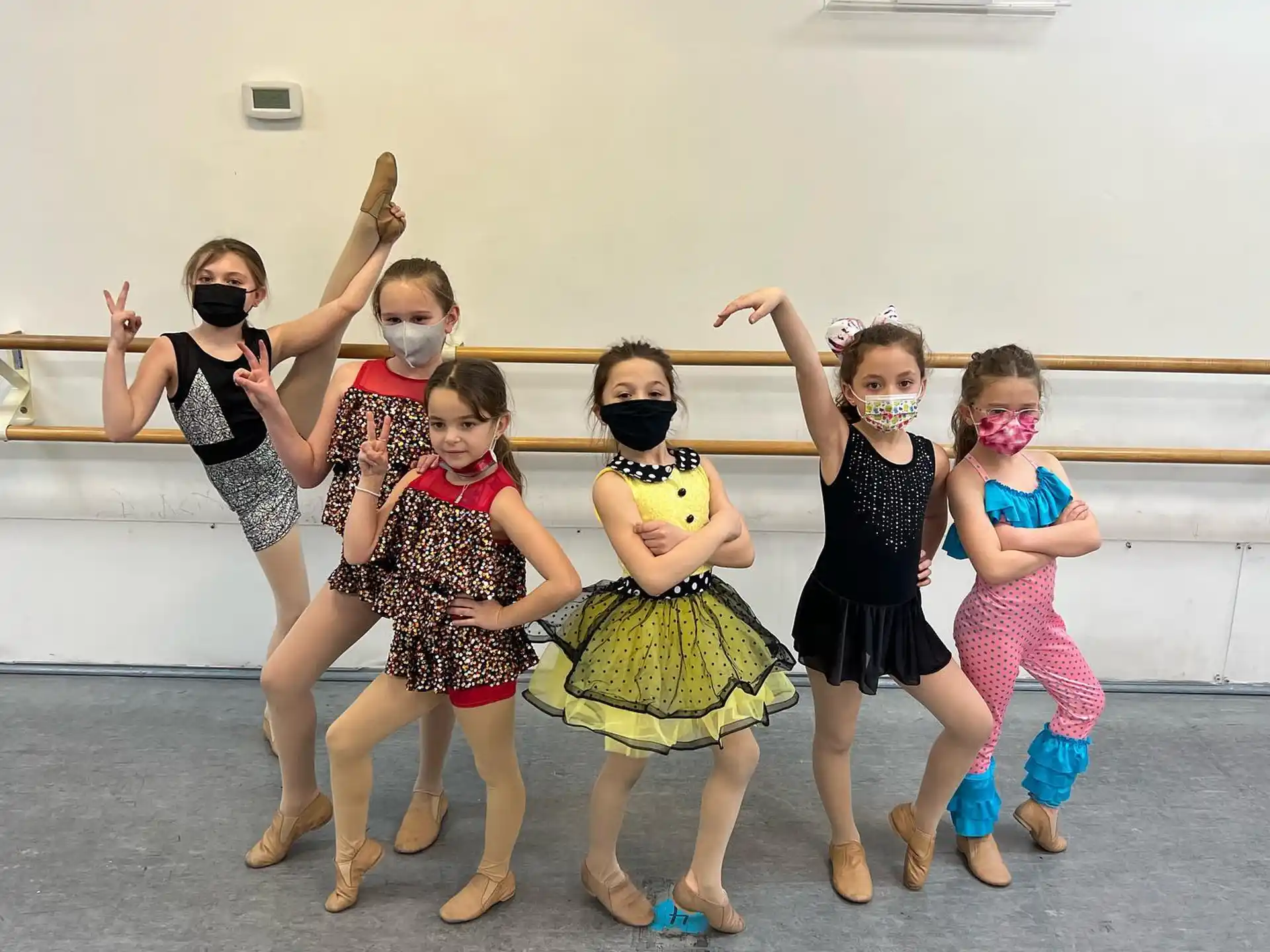 a group of children posing for a photo