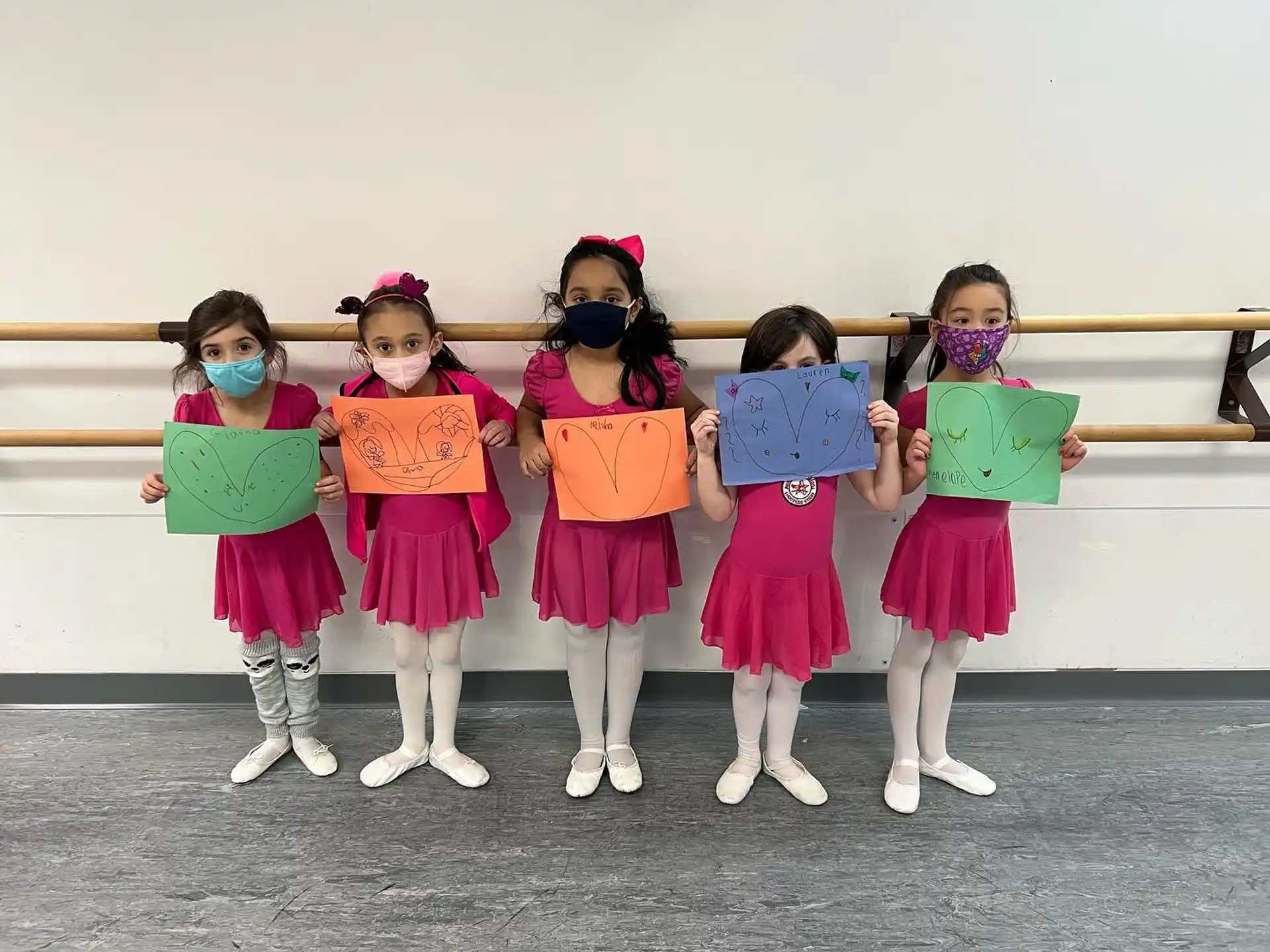 a group of girls wearing clothing