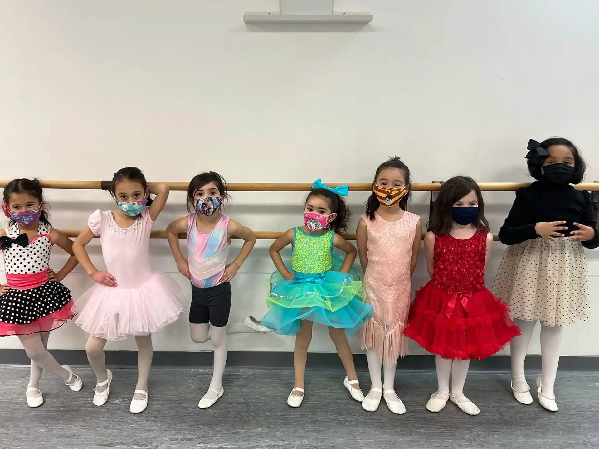 a group of girls wearing clothing