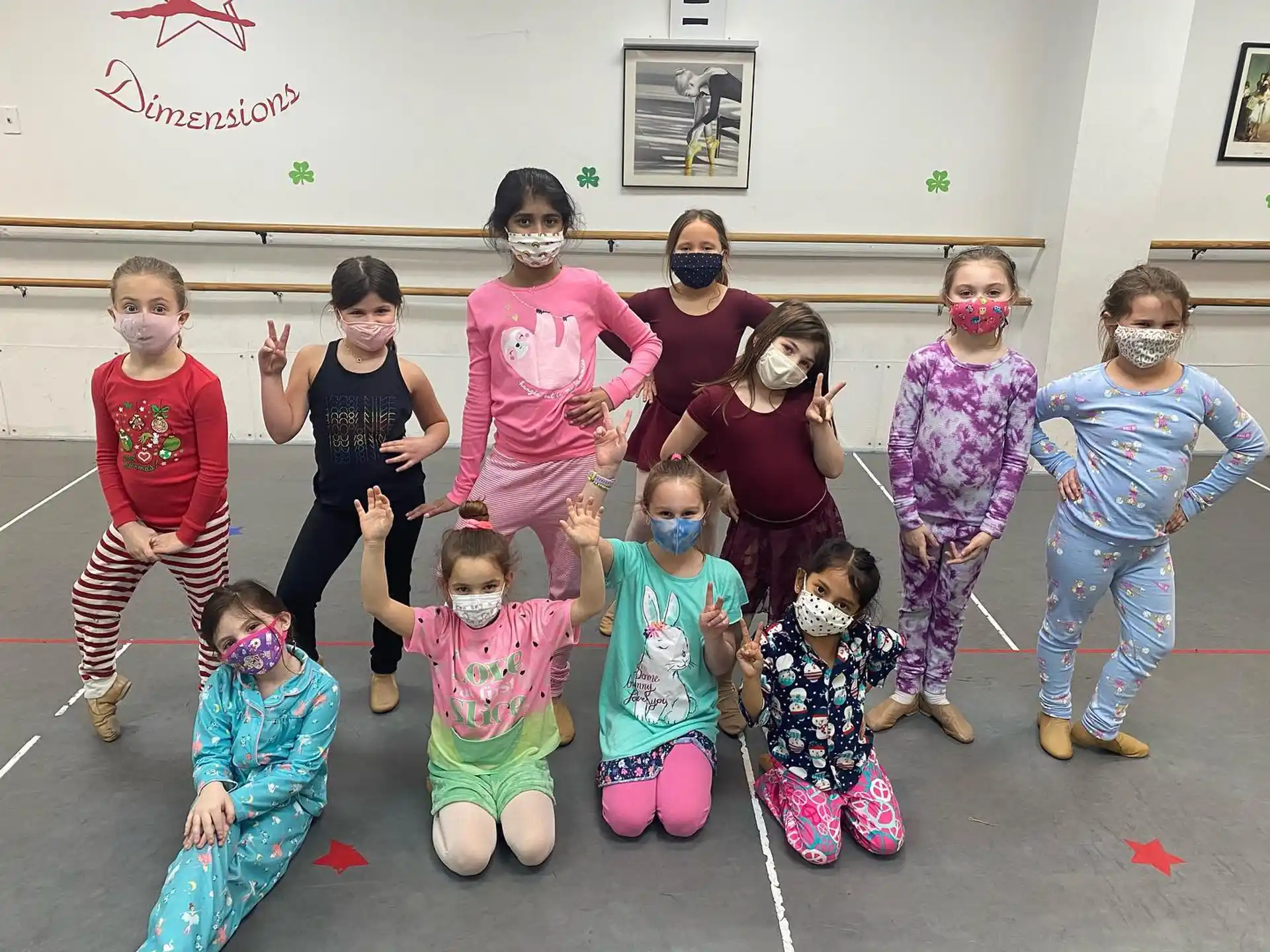 a group of people wearing masks