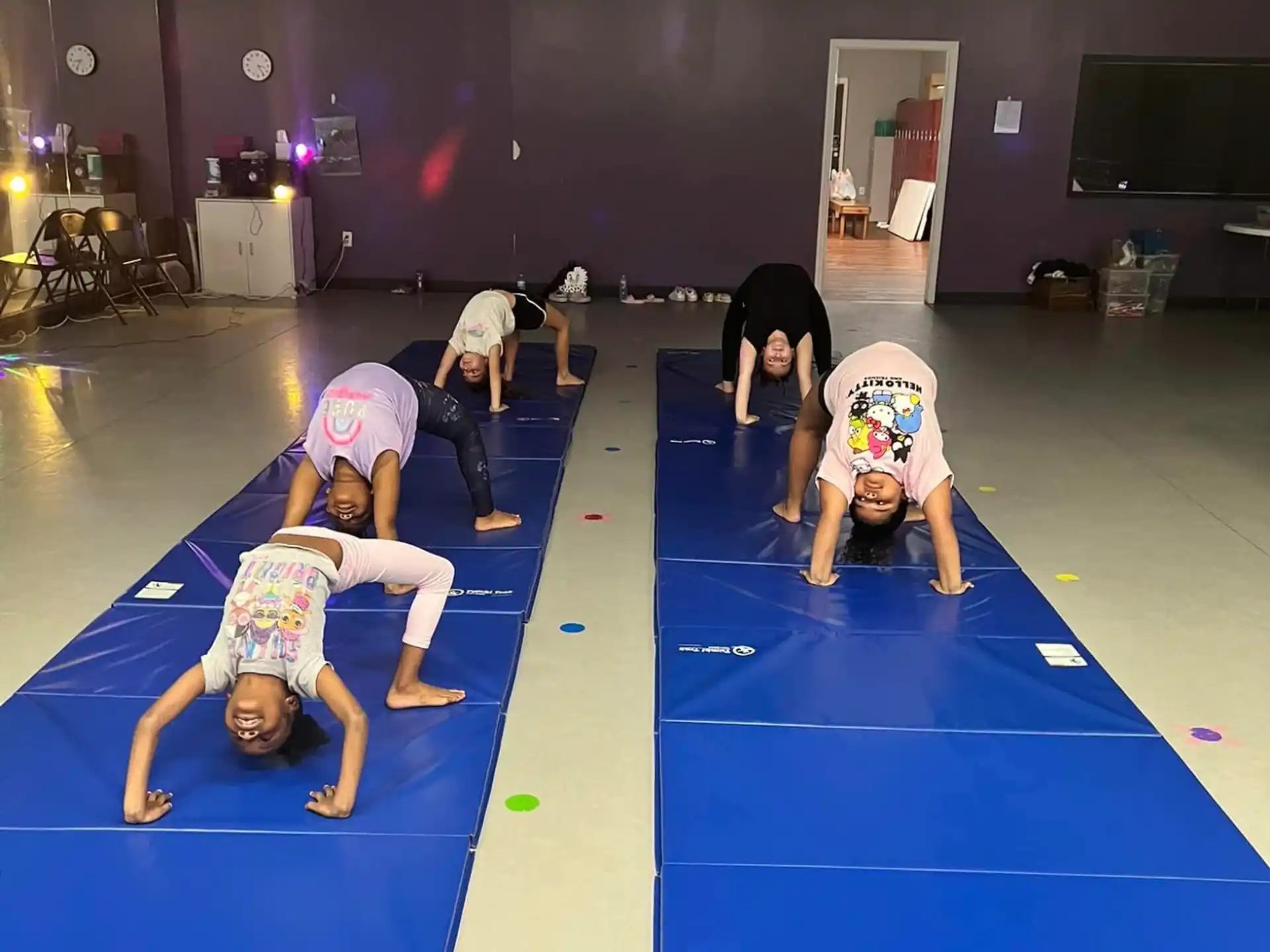 a group of people doing yoga