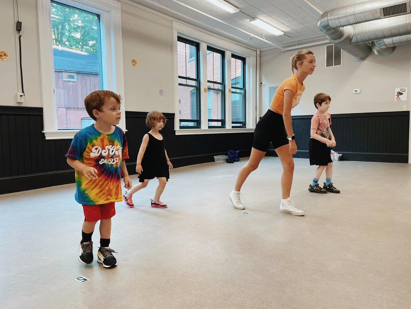 a group of kids playing in a room