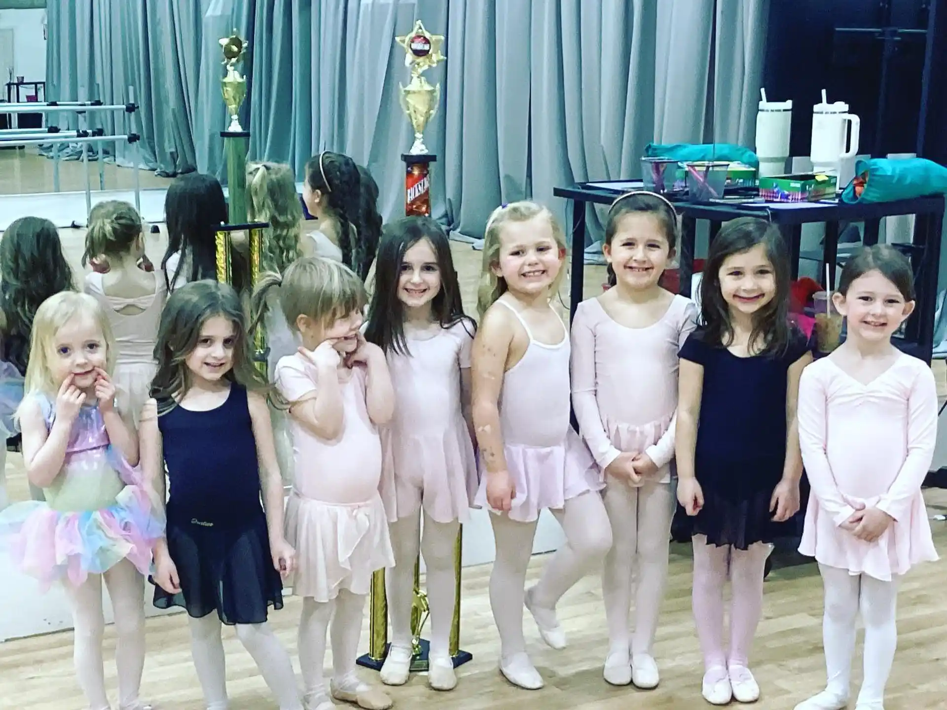 a group of girls posing for a photo