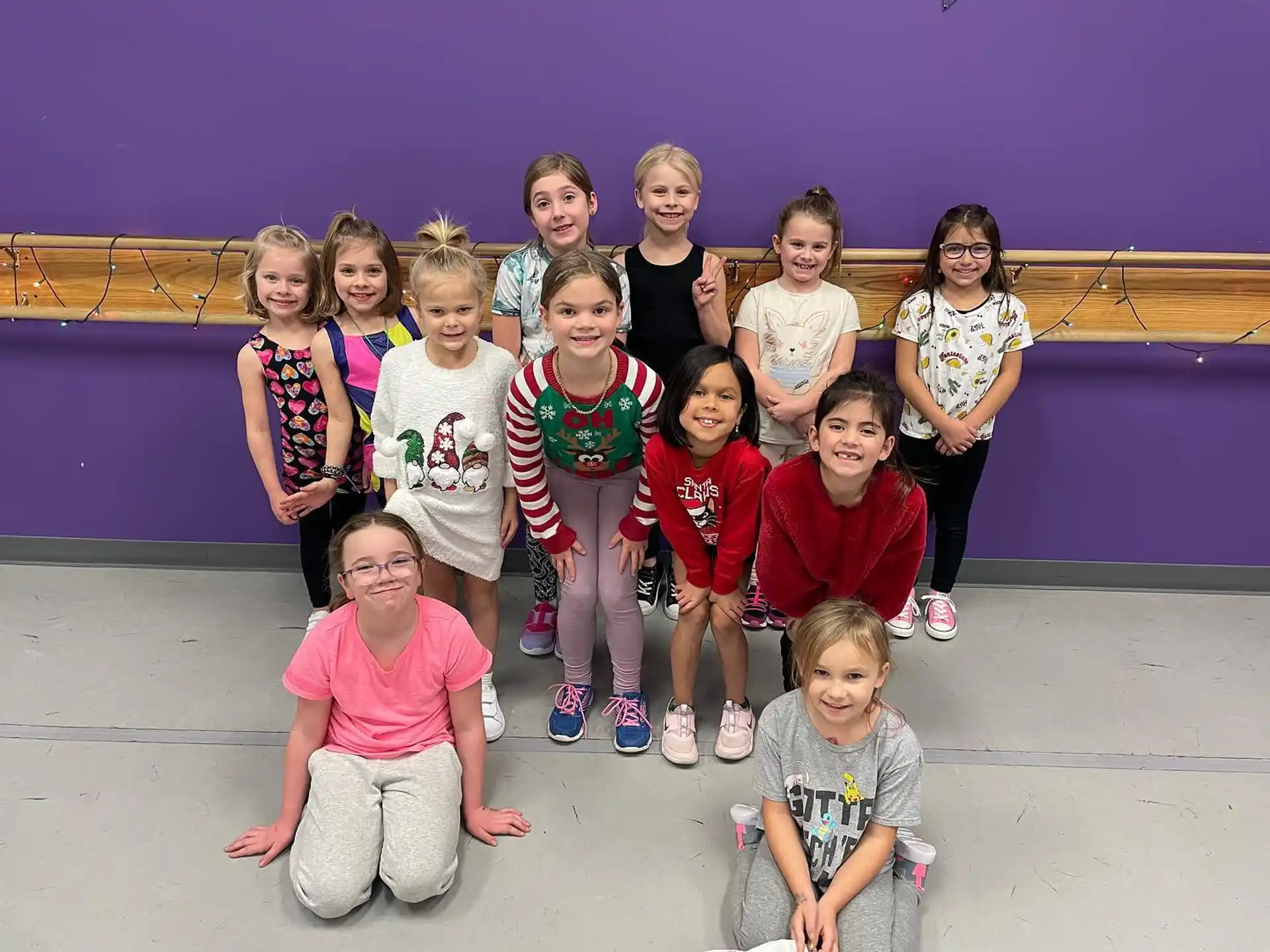 a group of children posing for a photo
