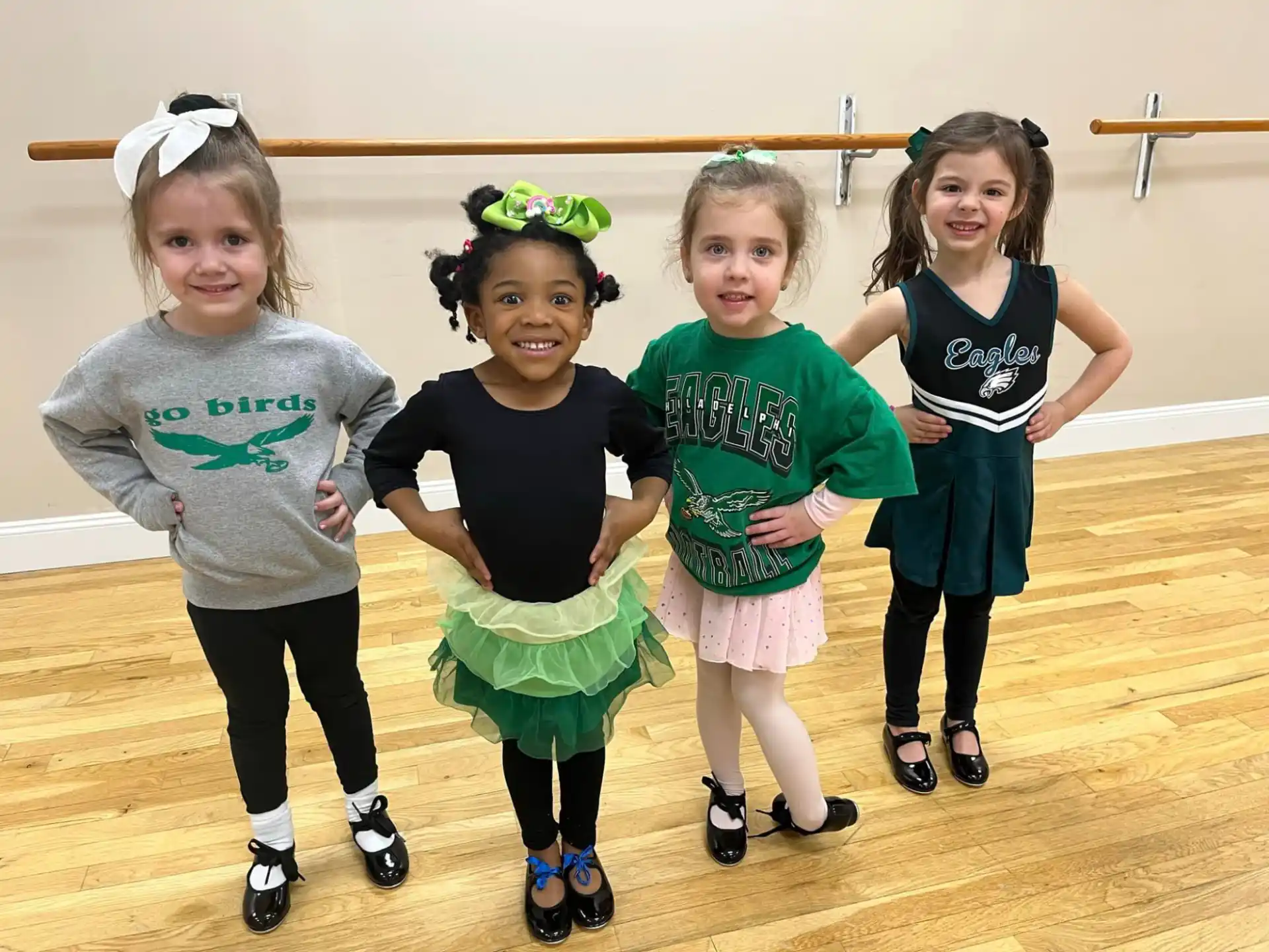 a group of girls posing for a picture