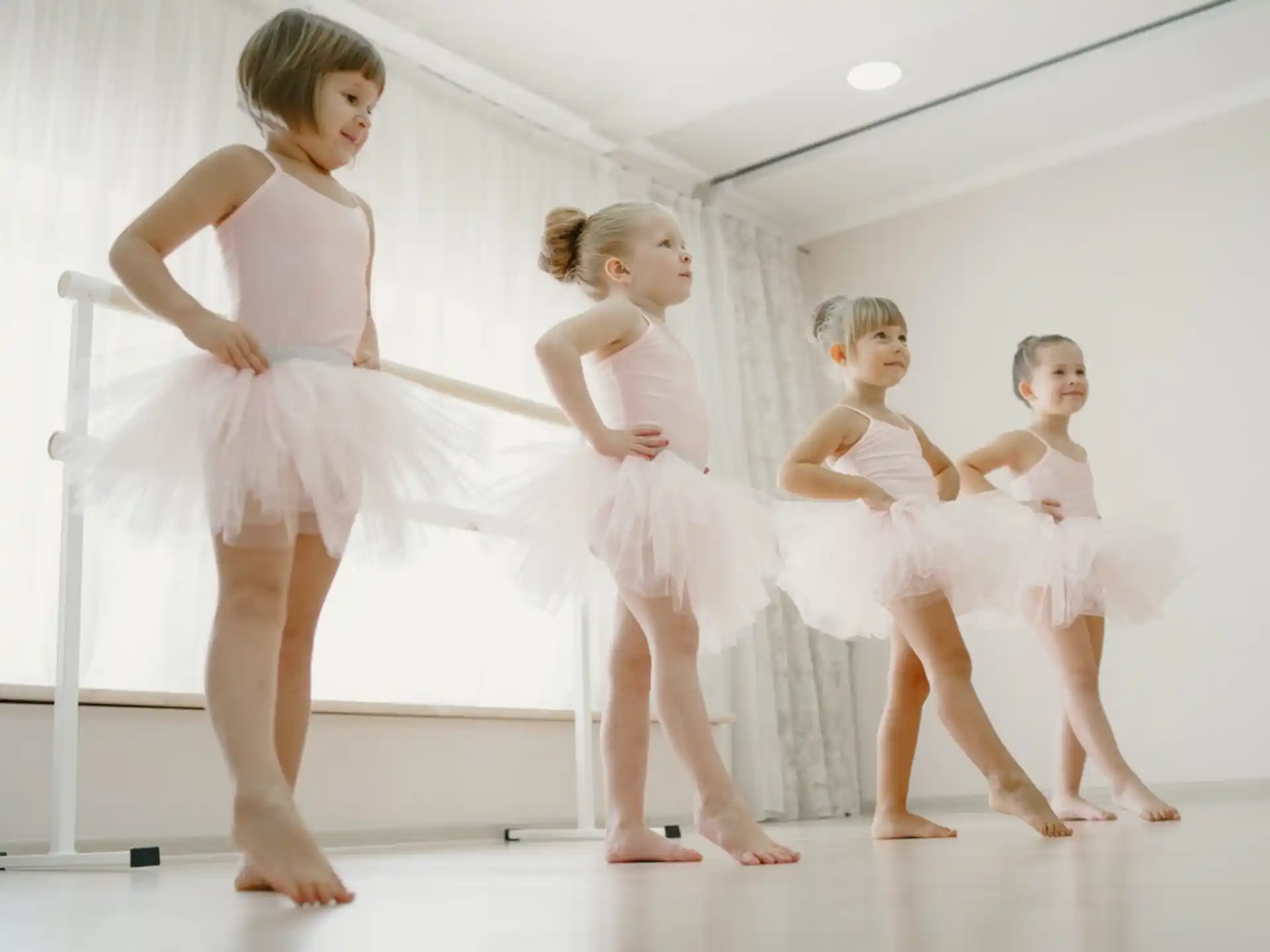 a person and a group of children dancing