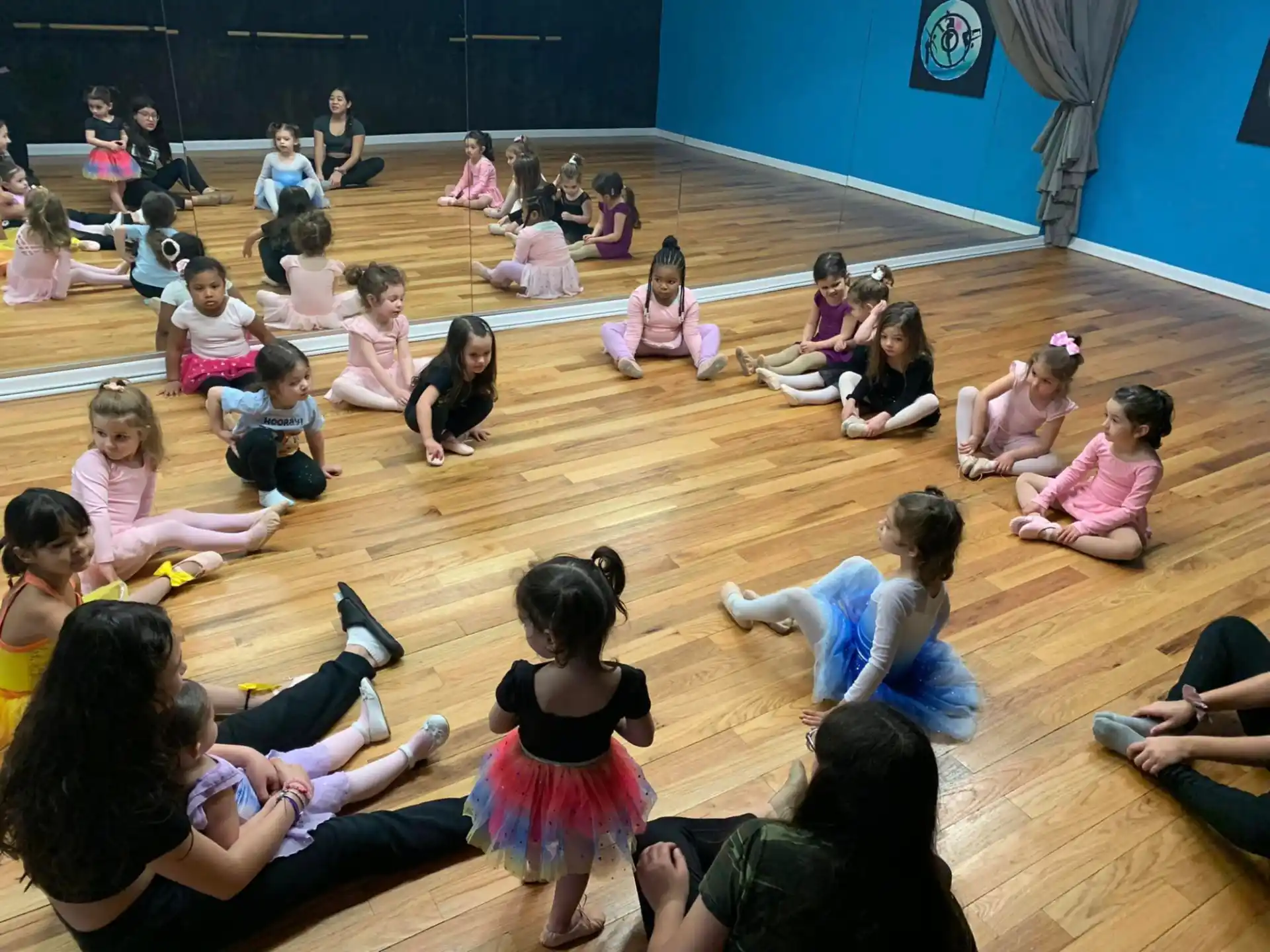a group of children sitting on the floor