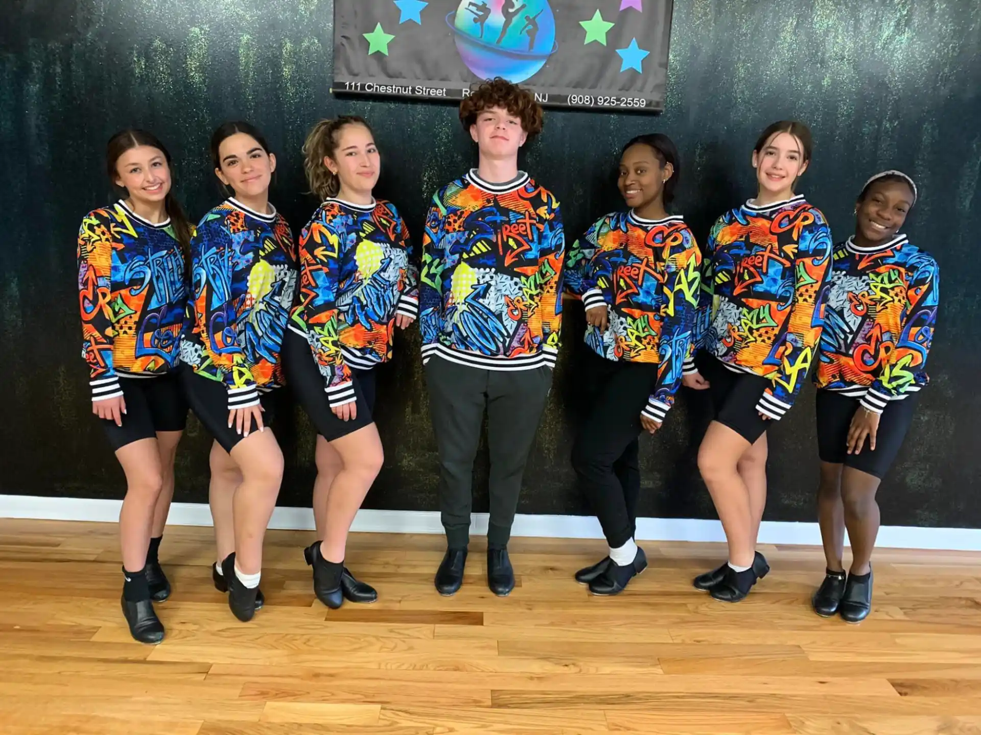 a group of people in matching outfits