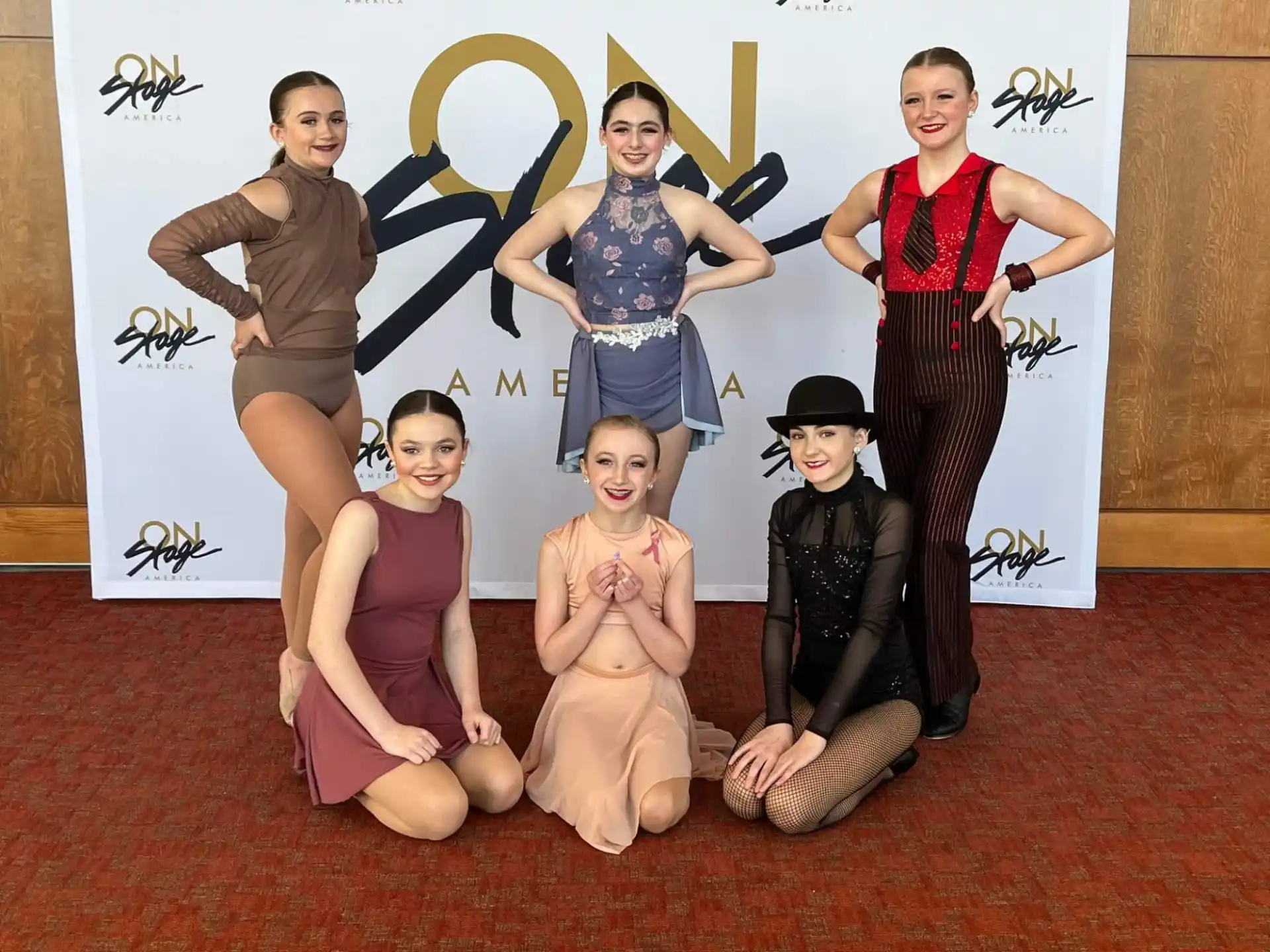 a group of people posing for a photo