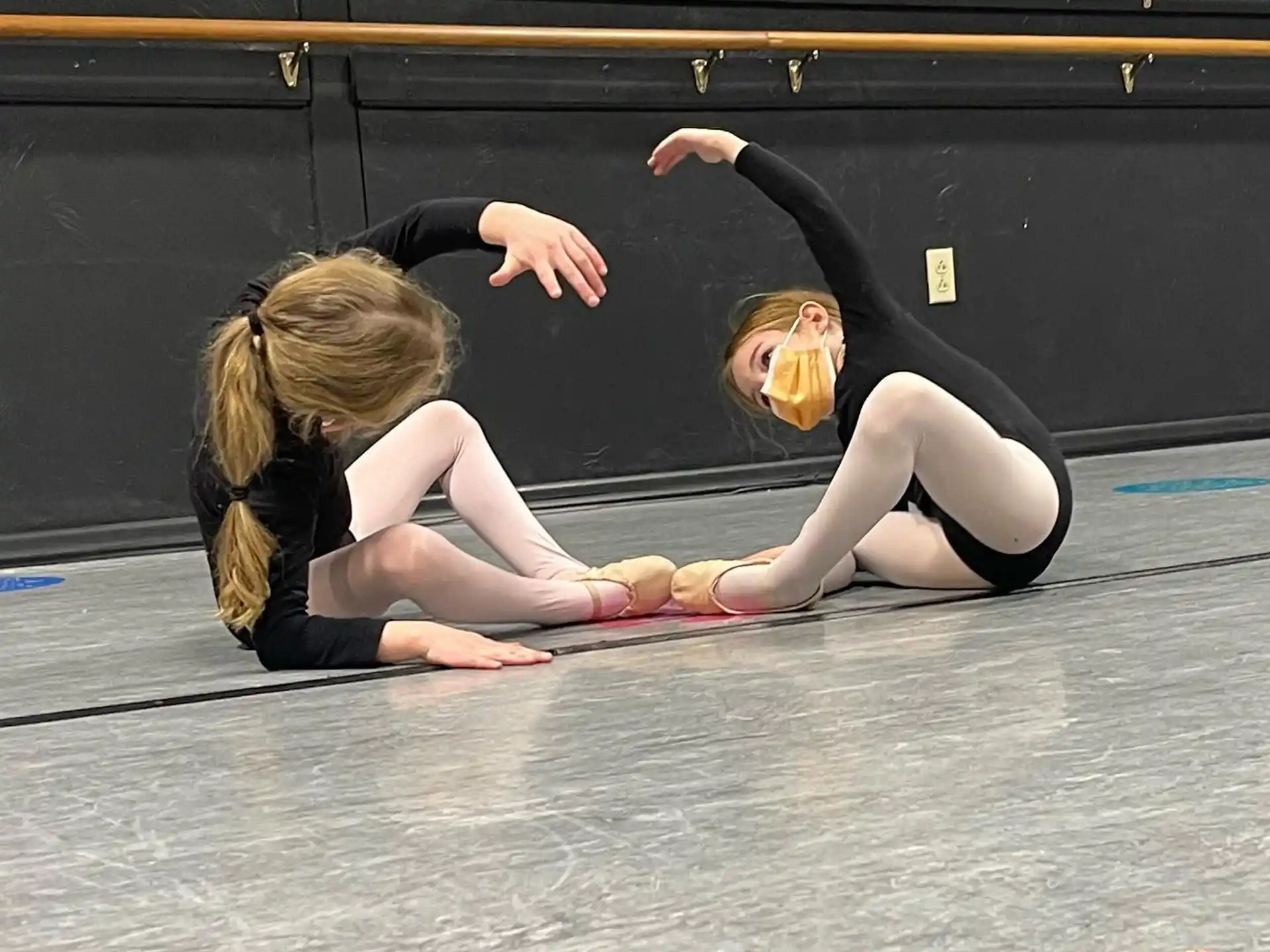 a couple of women doing yoga