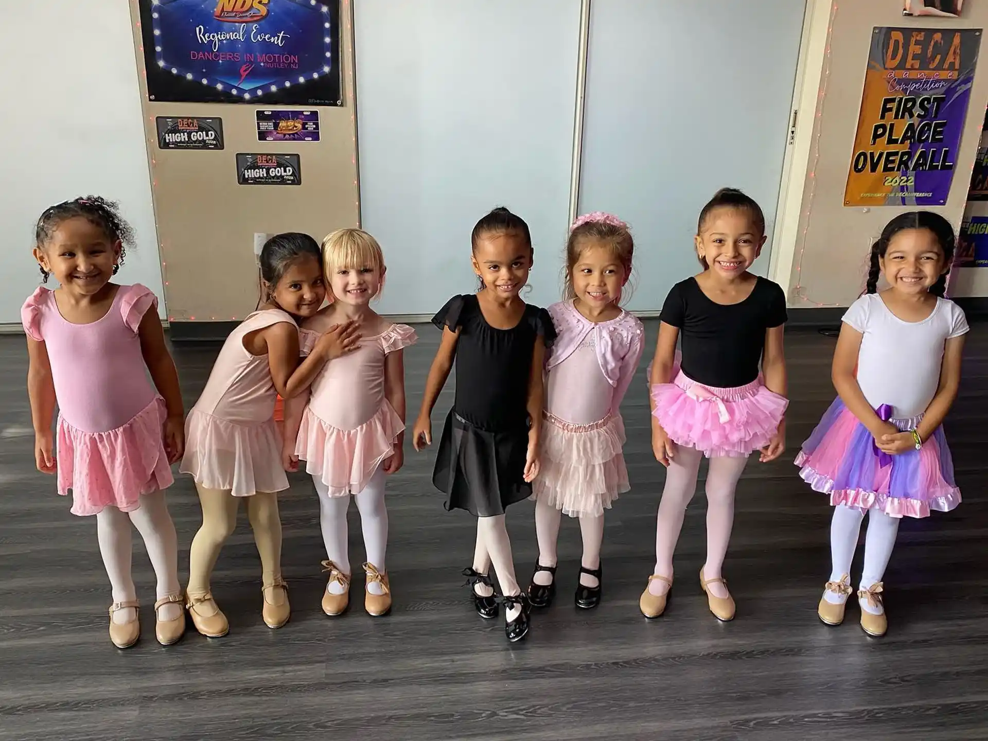 a group of girls posing for a photo