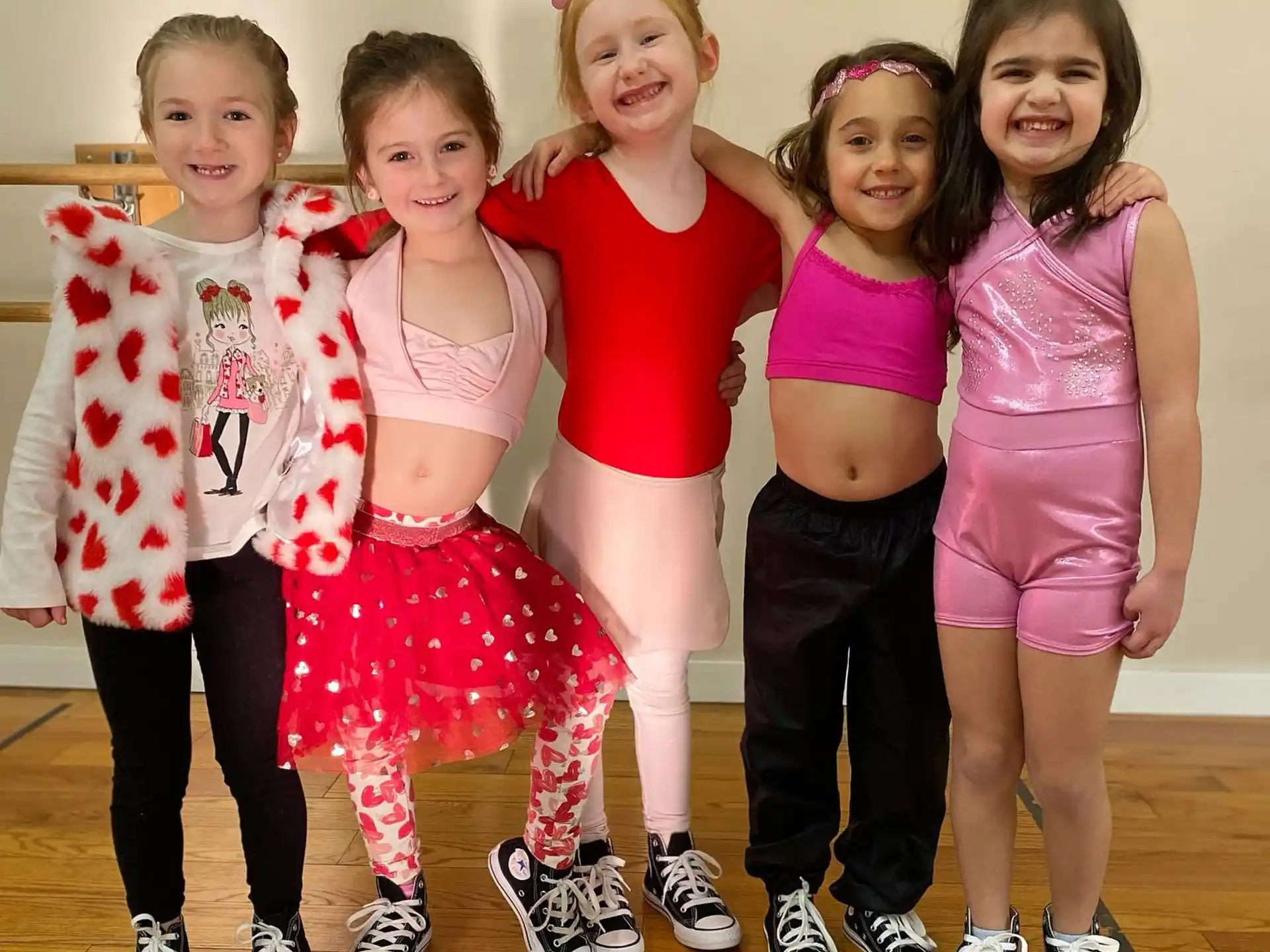 a group of girls posing for a photo