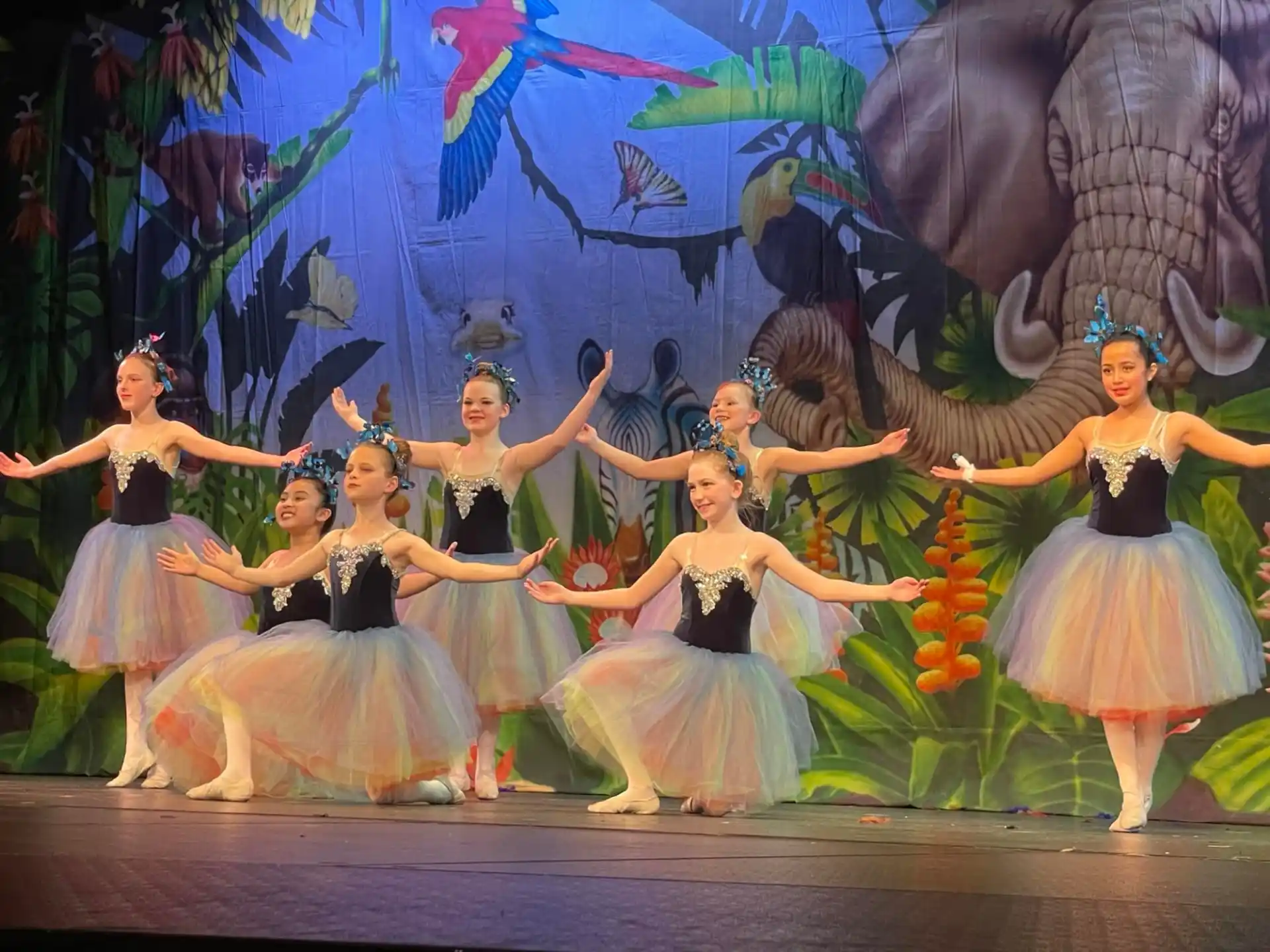 a group of women dancing on a stage