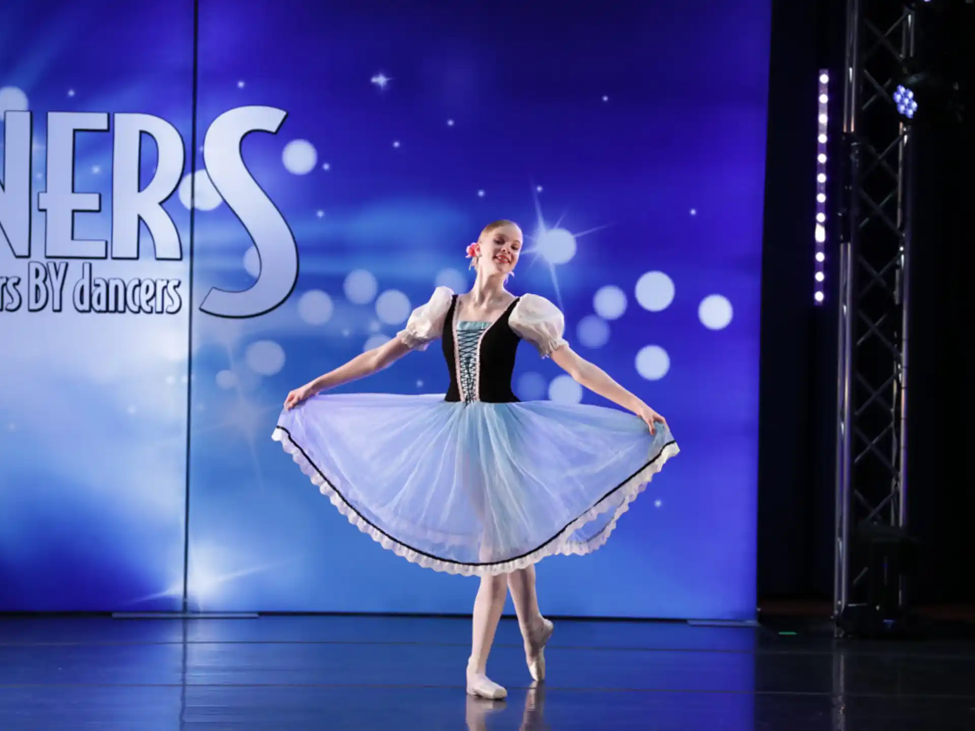 a person dancing on a stage