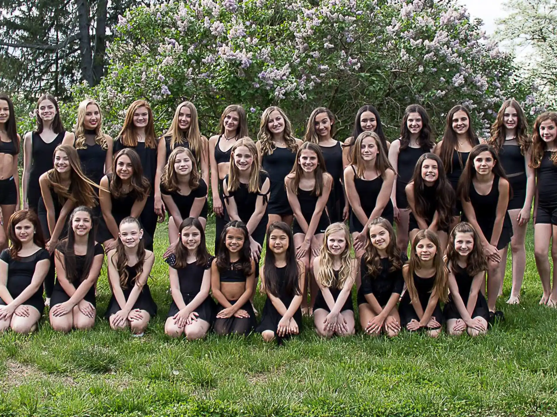 a group of women posing for a photo