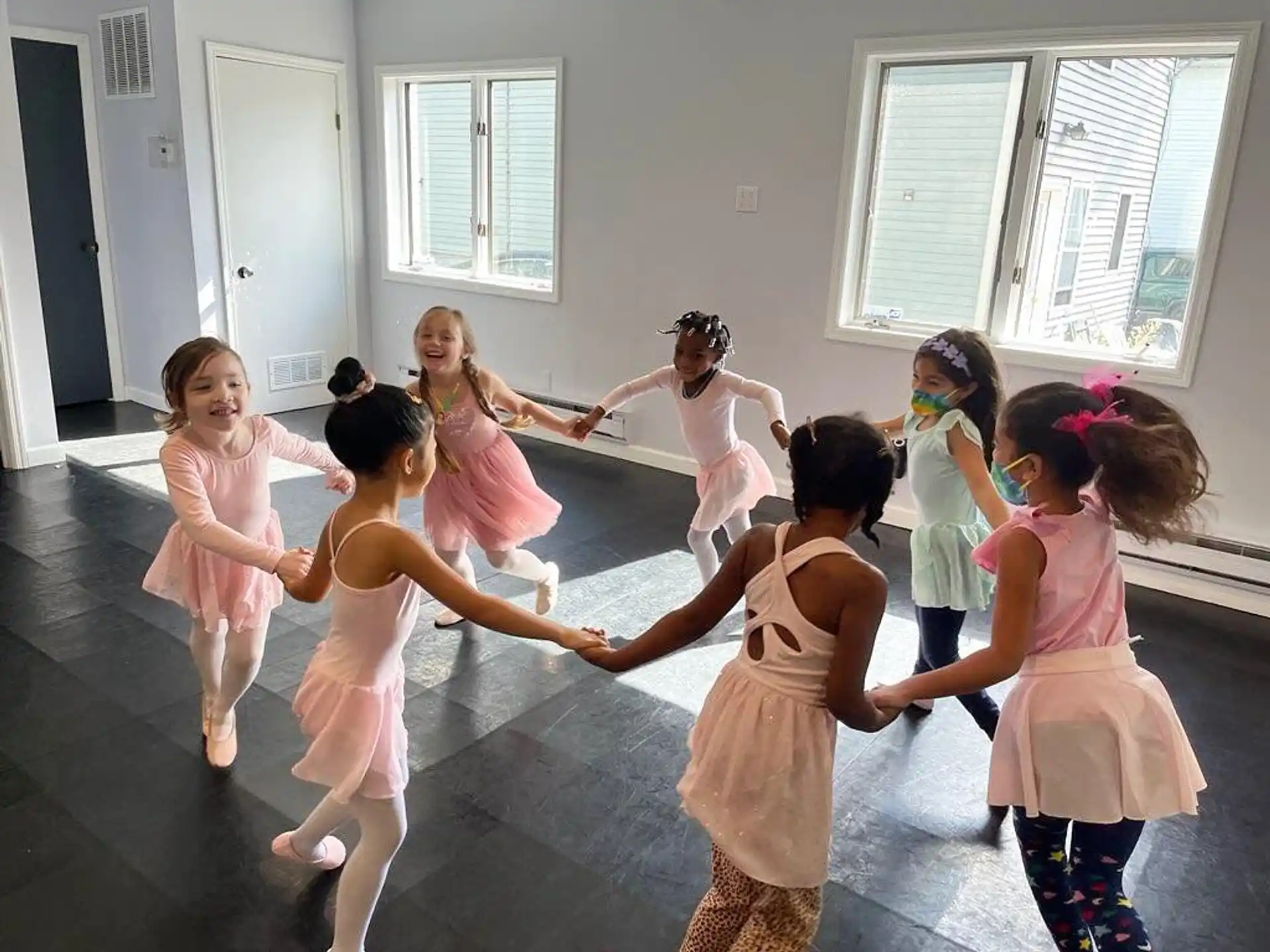 a group of children dancing