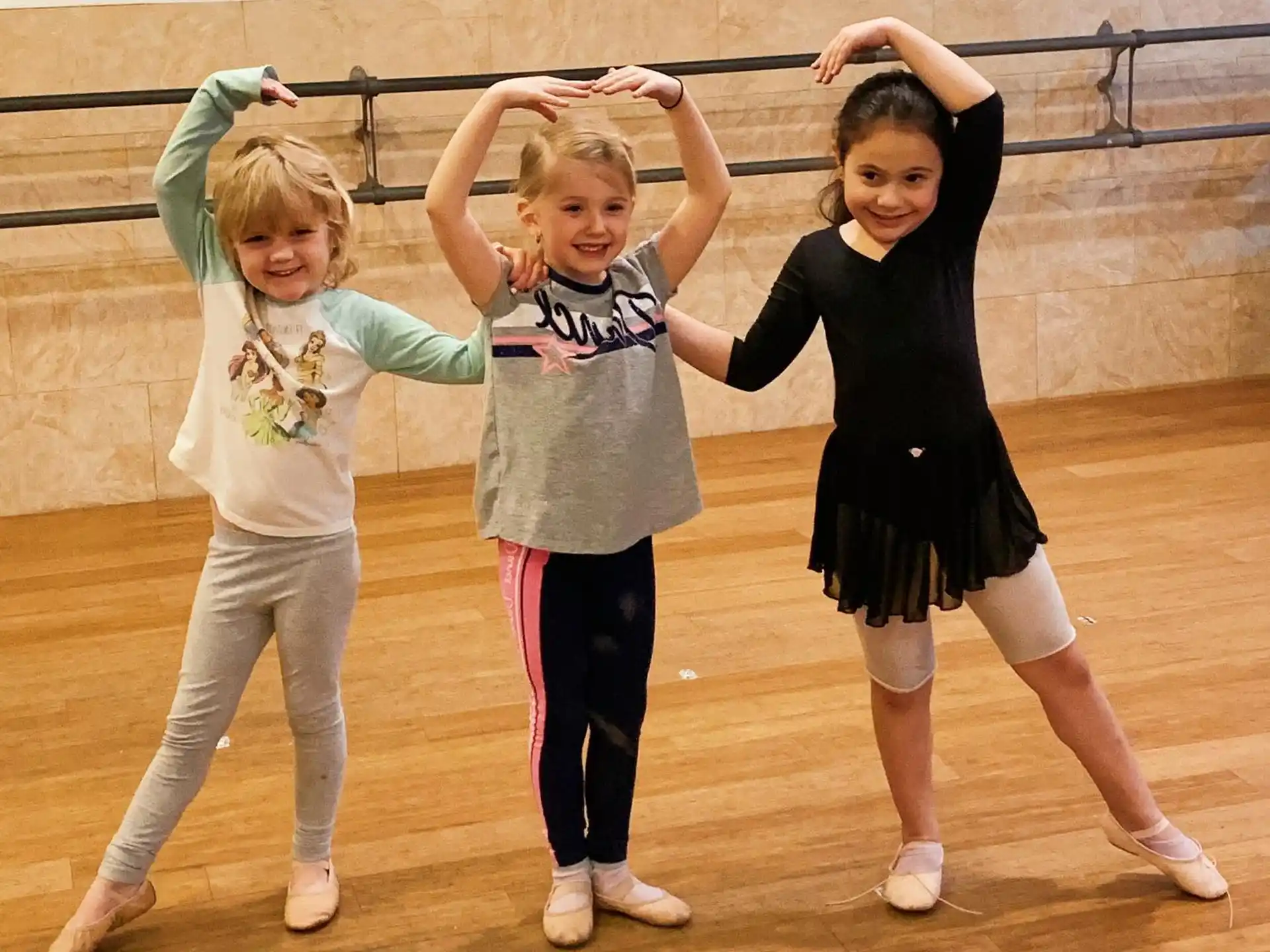 a group of girls posing for a picture