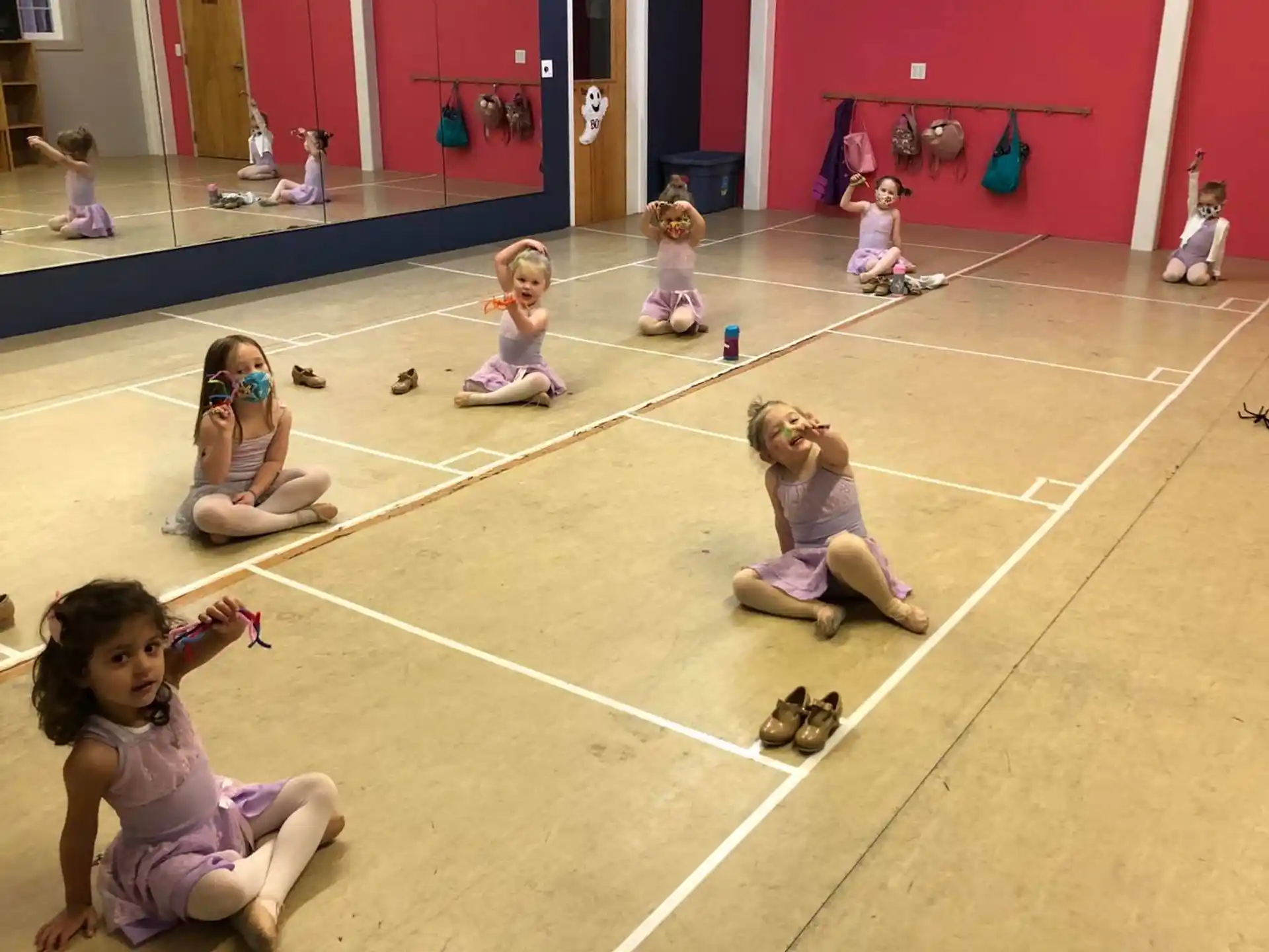 a group of children playing on the floor