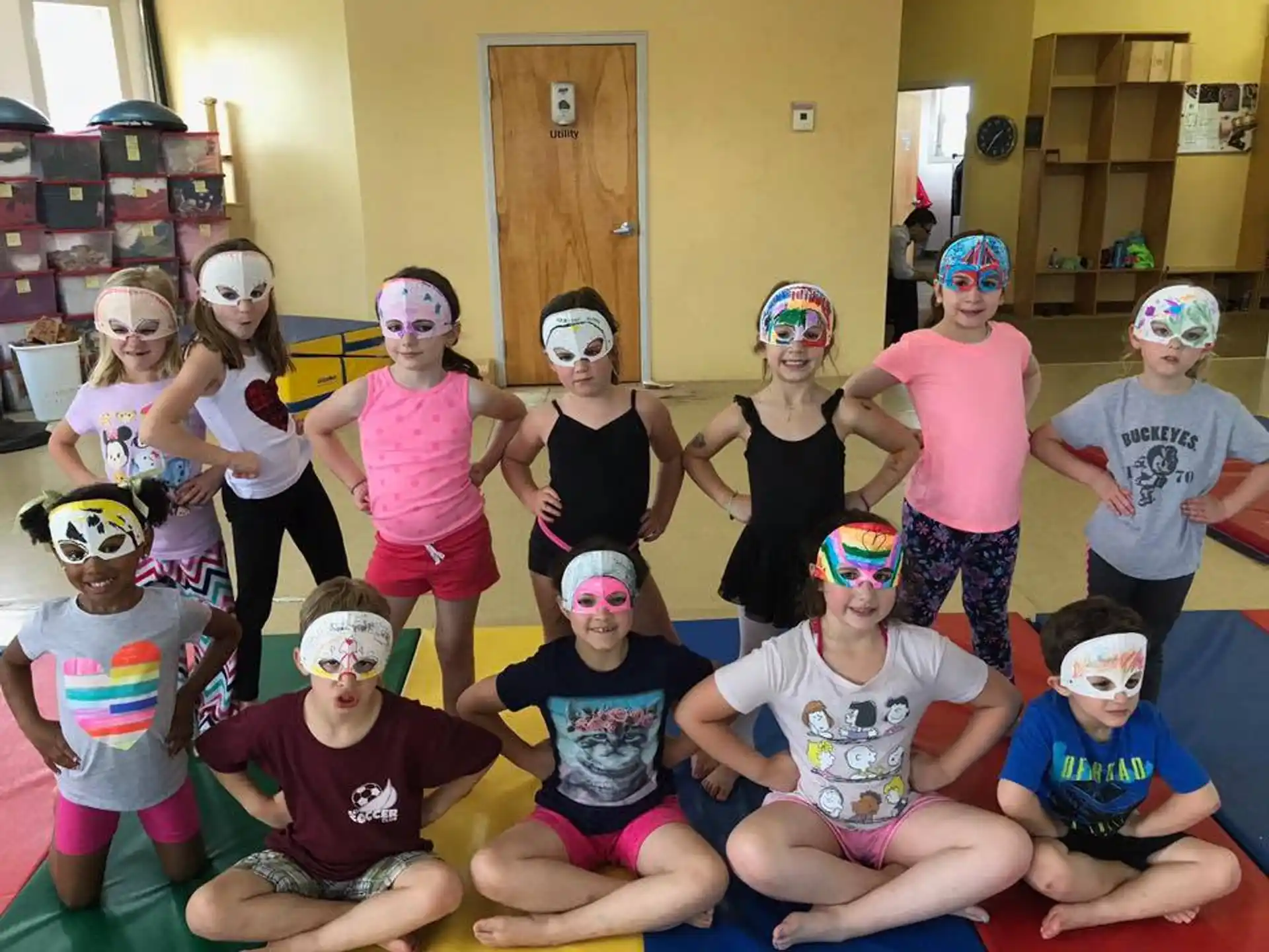 a group of people wearing masks
