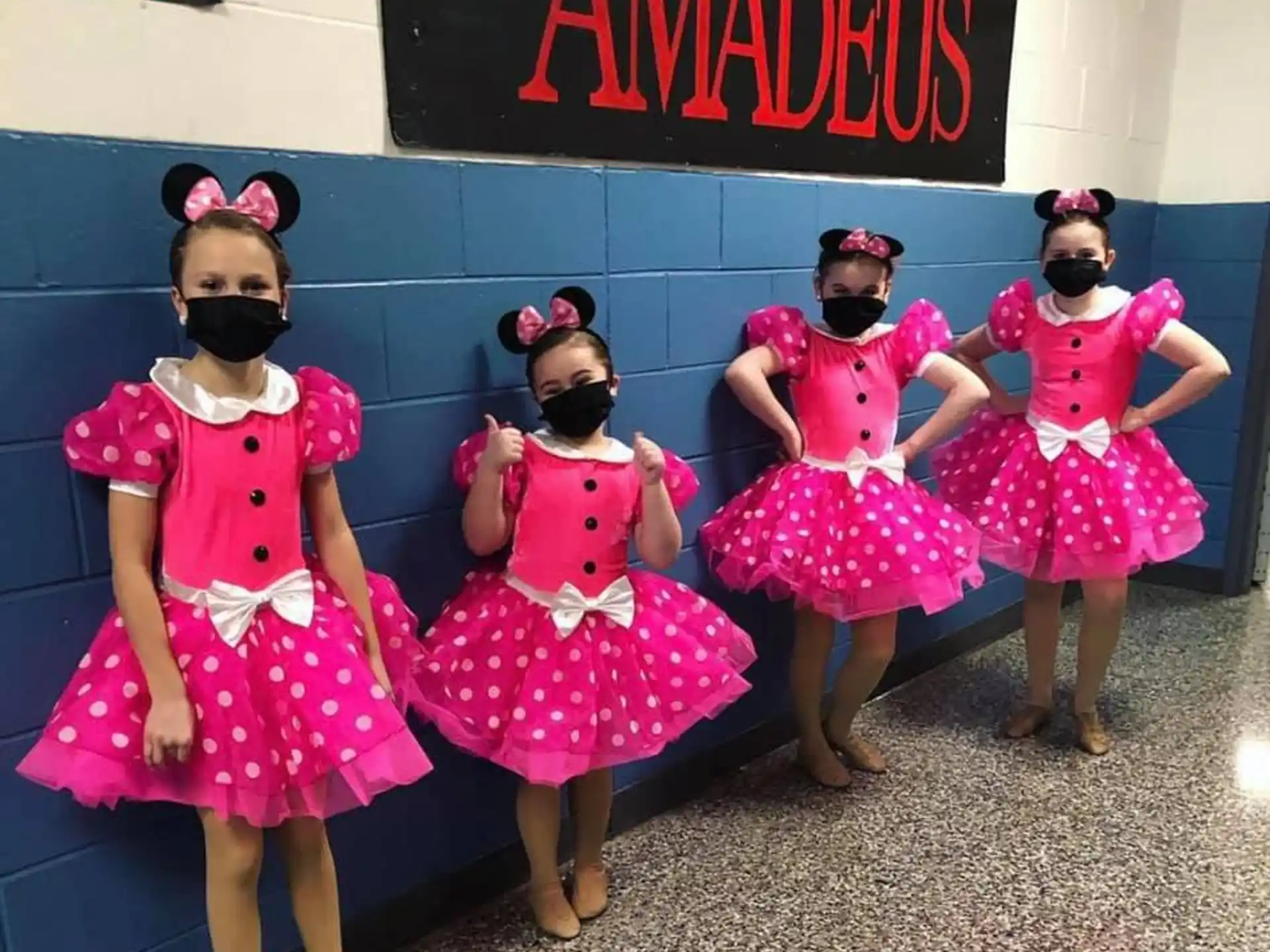 a group of girls wearing clothing