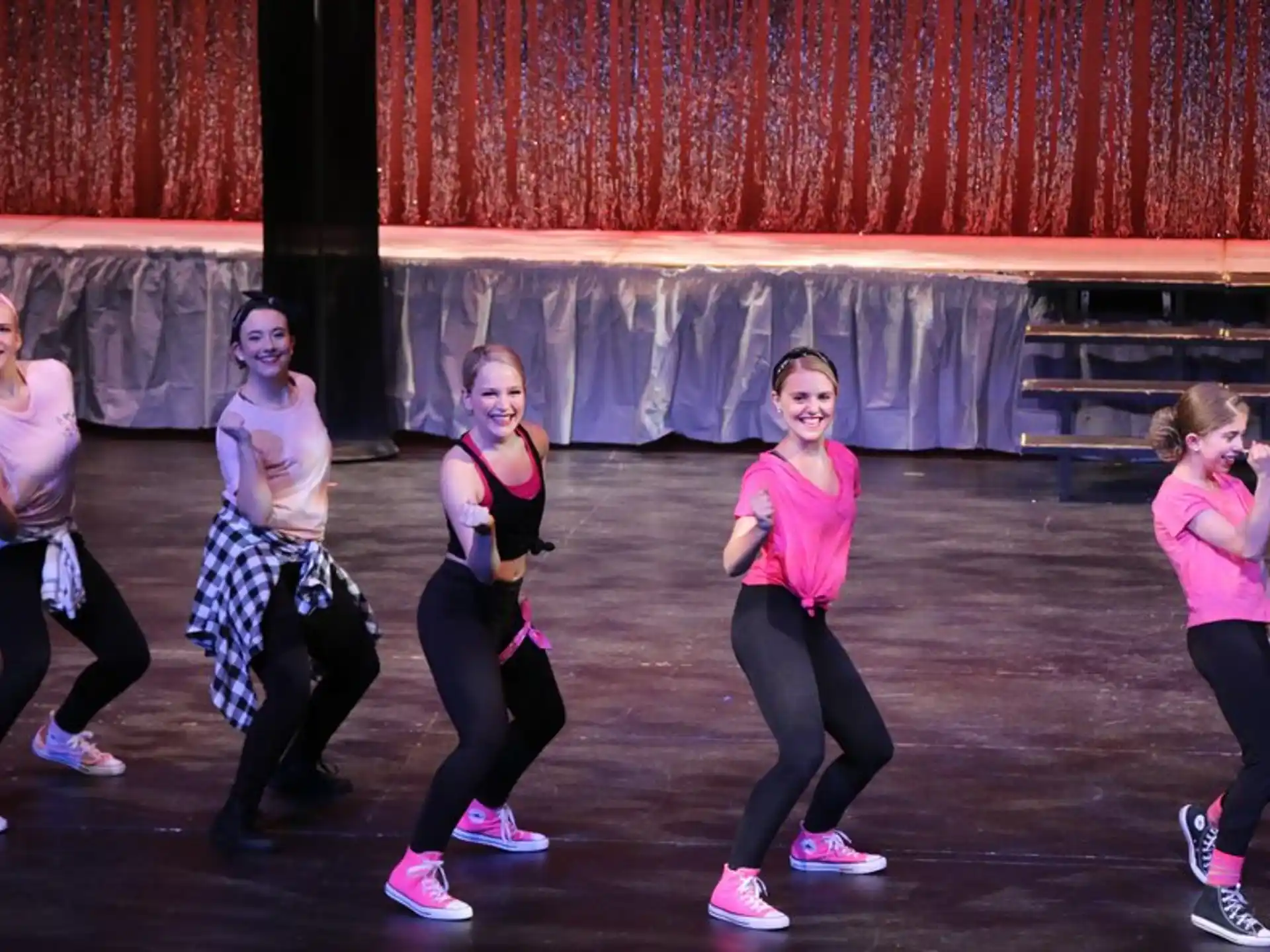 a group of girls posing for a photo