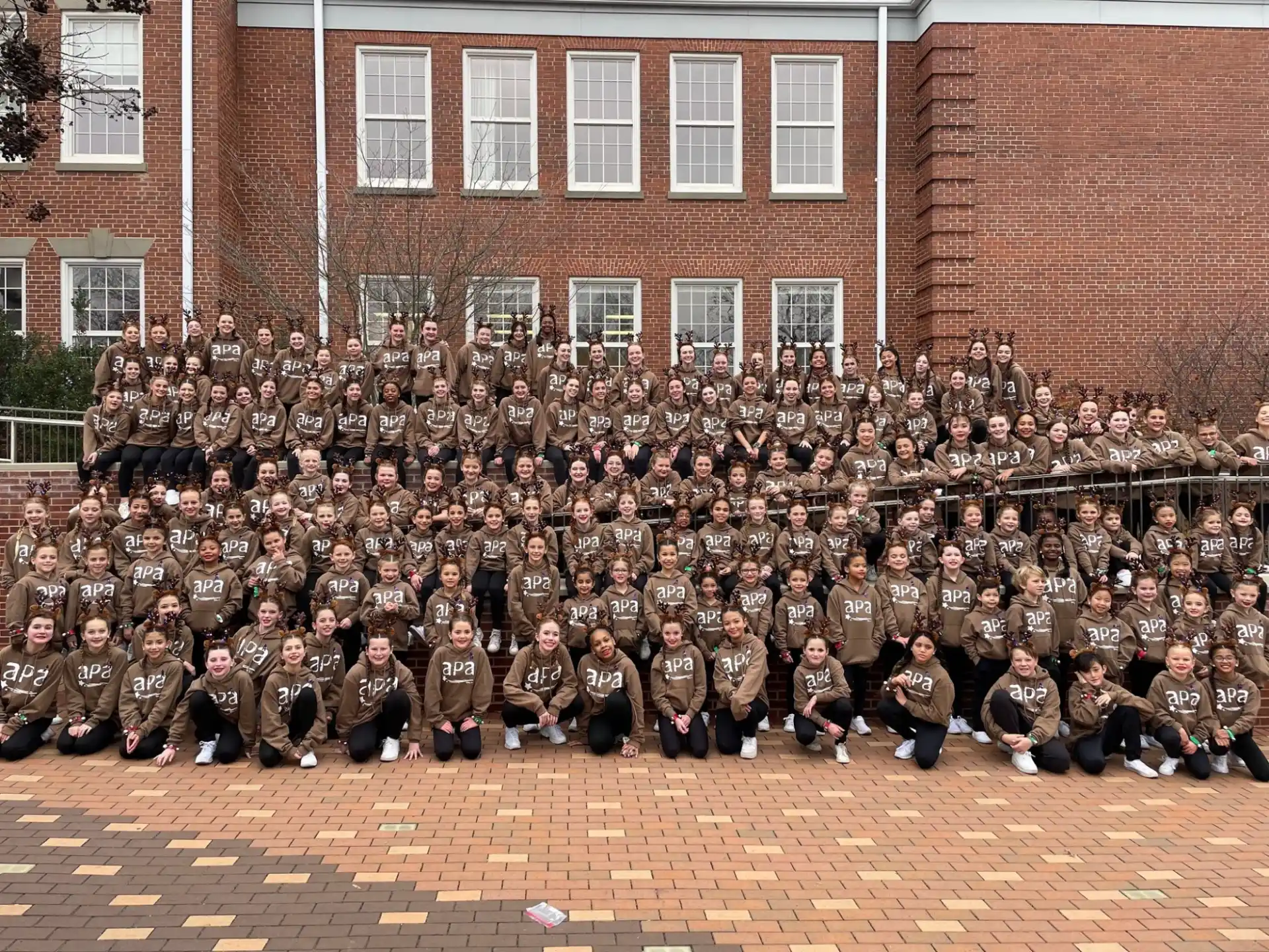a large group of people posing for a photo