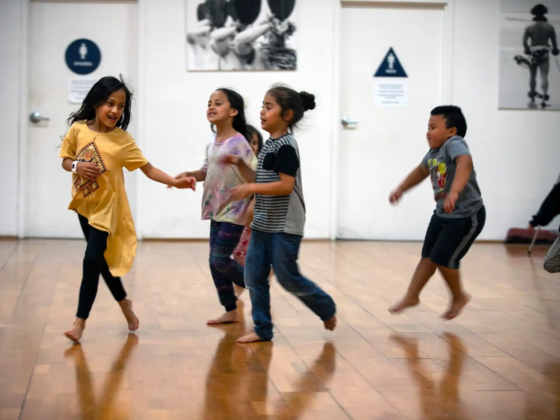 a group of children dancing