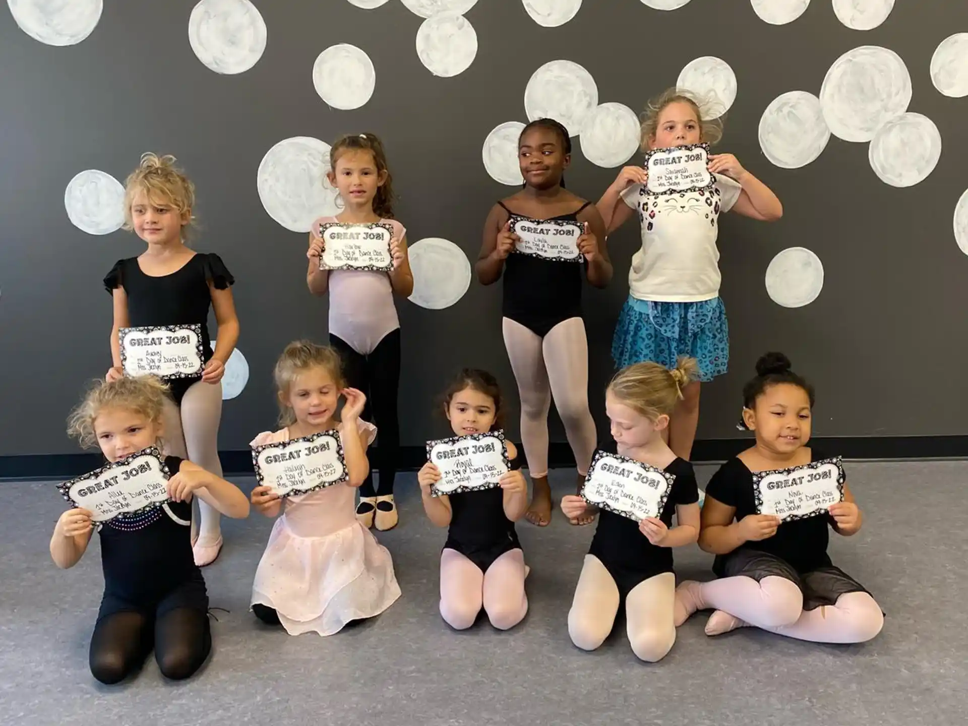 a group of children posing for a photo