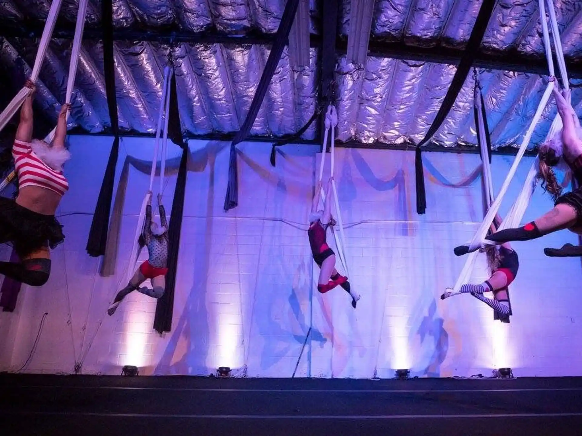 a group of people from ropes
