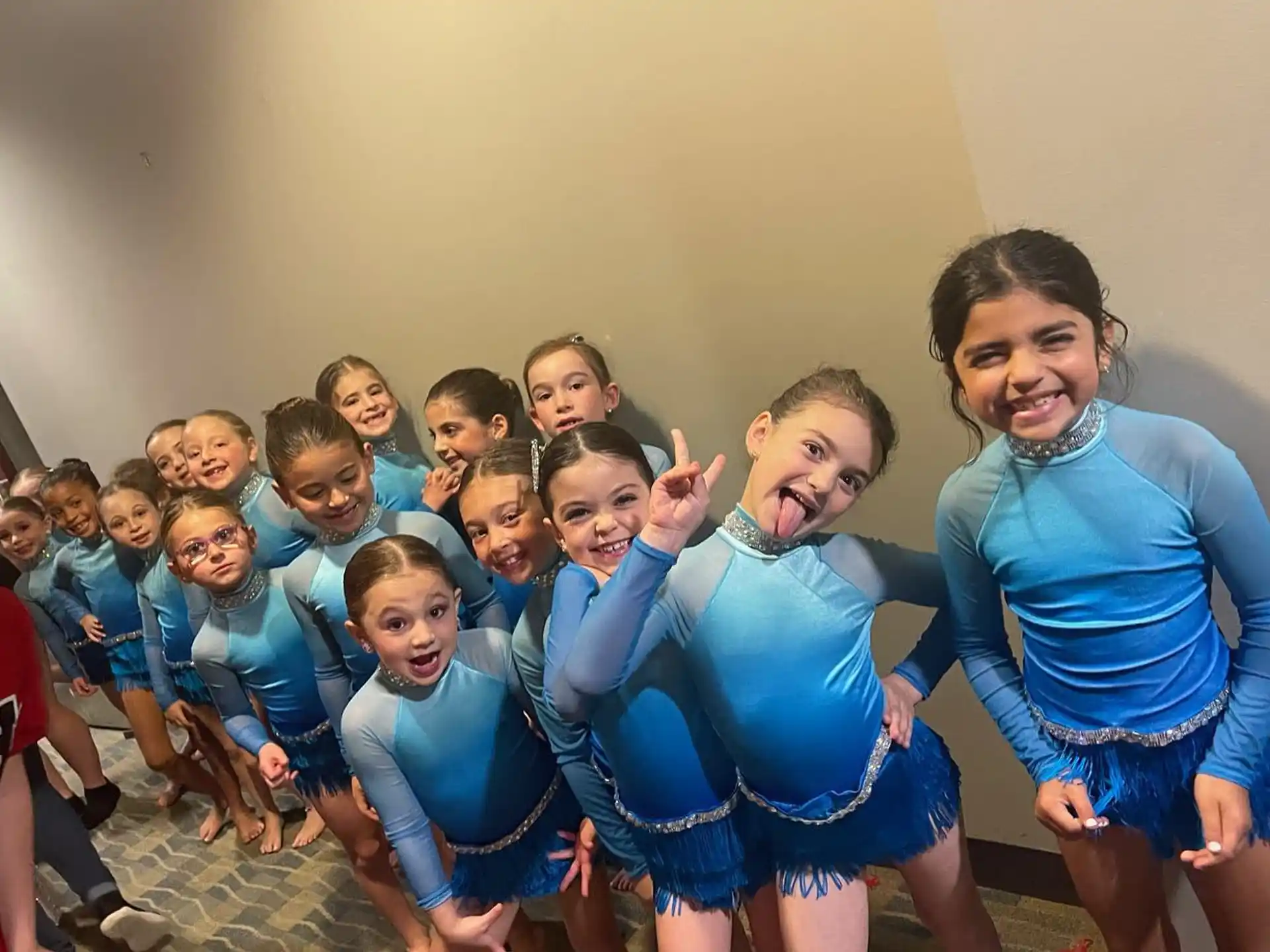 a group of children posing for a photo