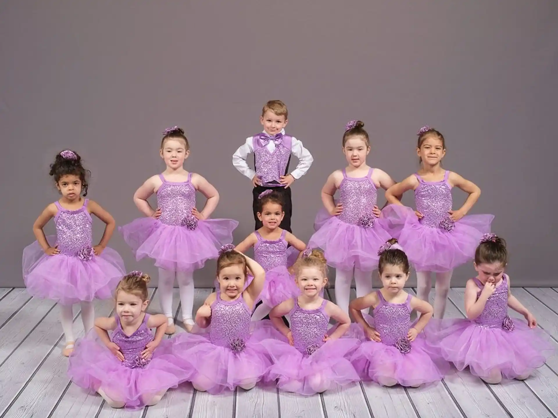 a group of people in dresses