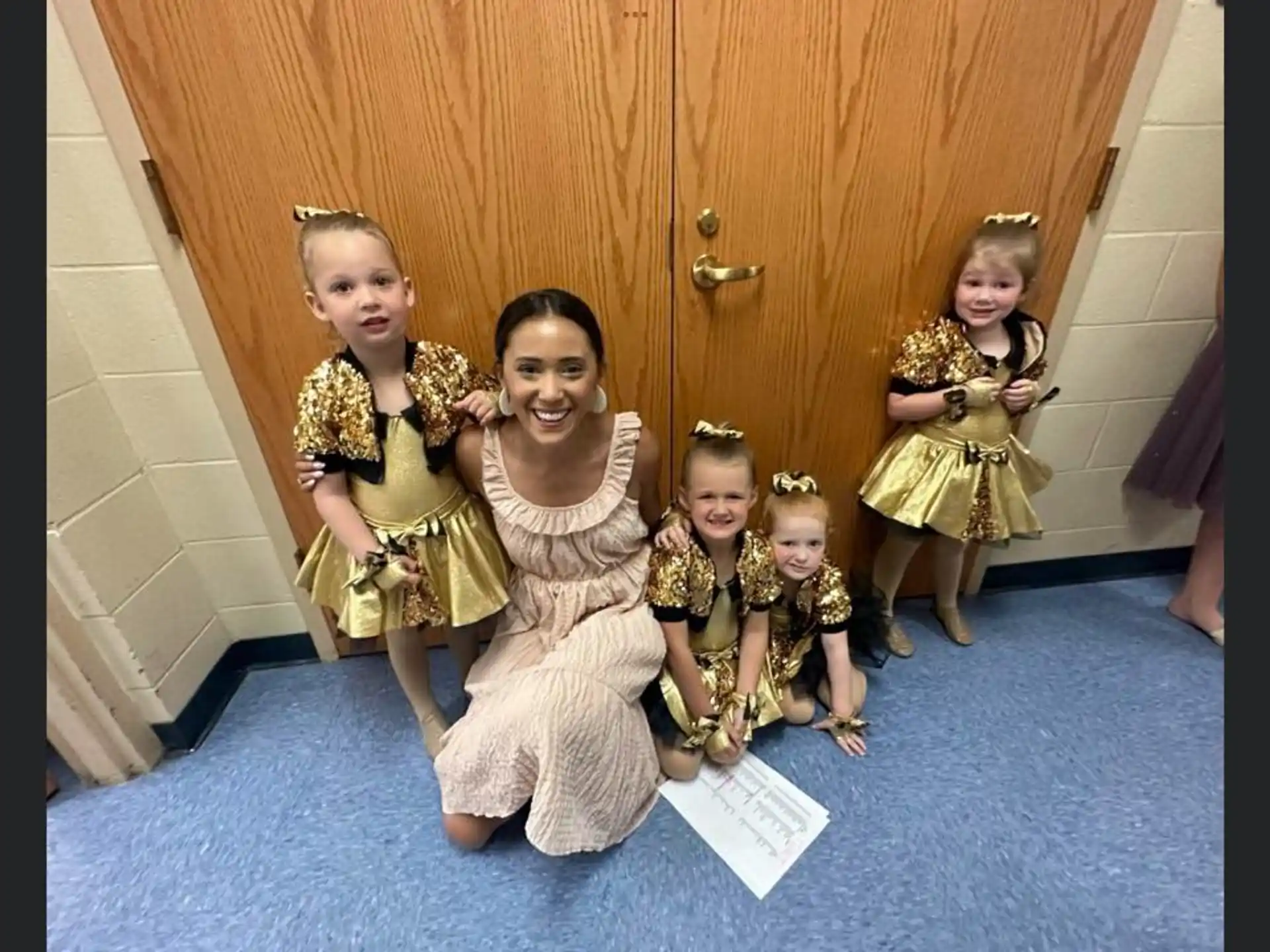 a group of girls in clothing