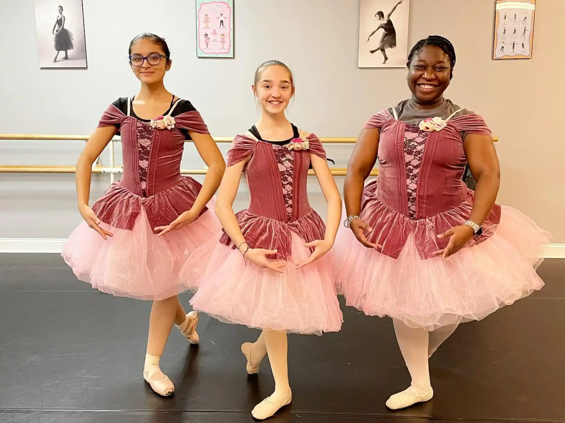 a group of women in dresses