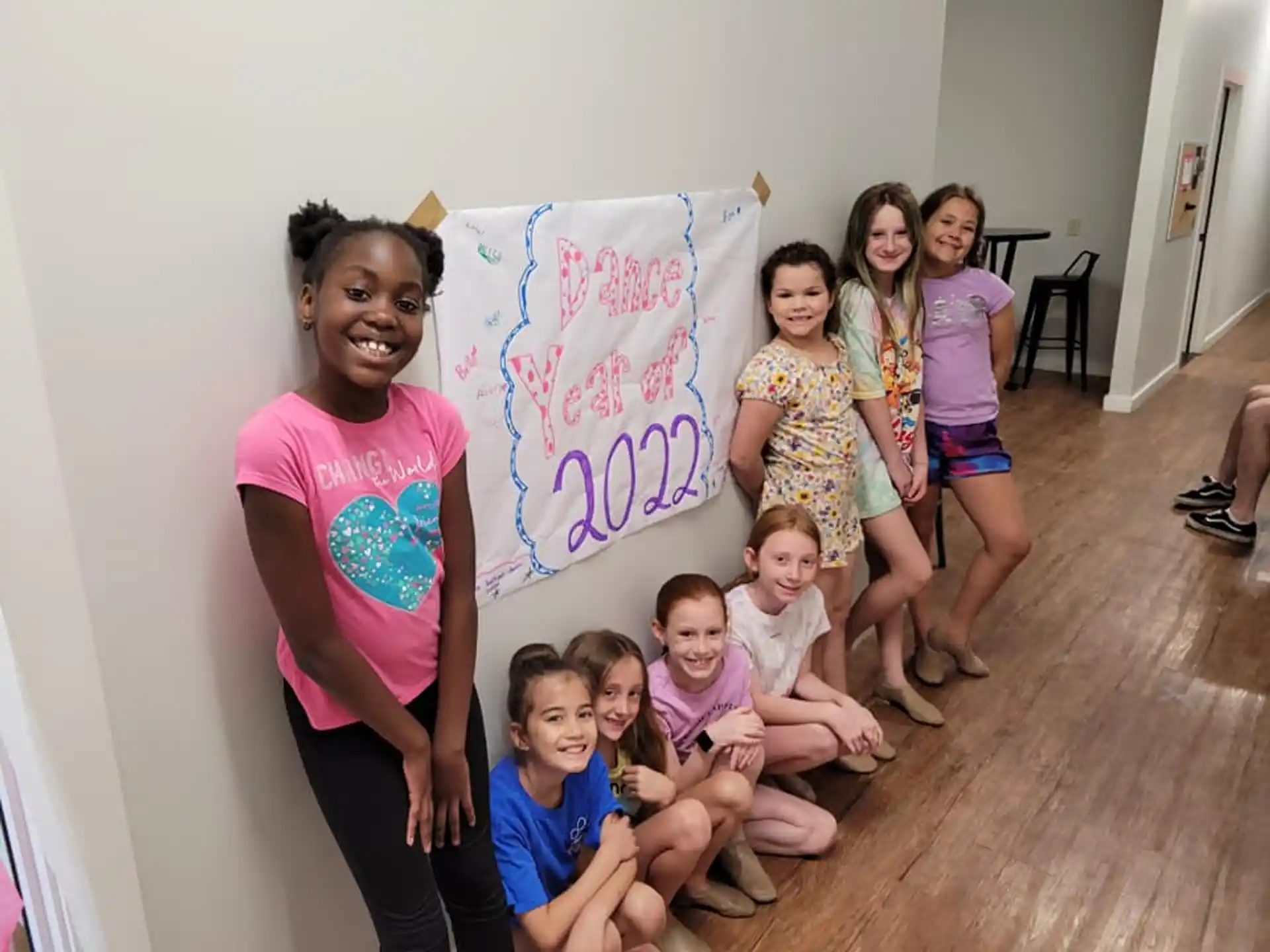 a group of children posing for a photo