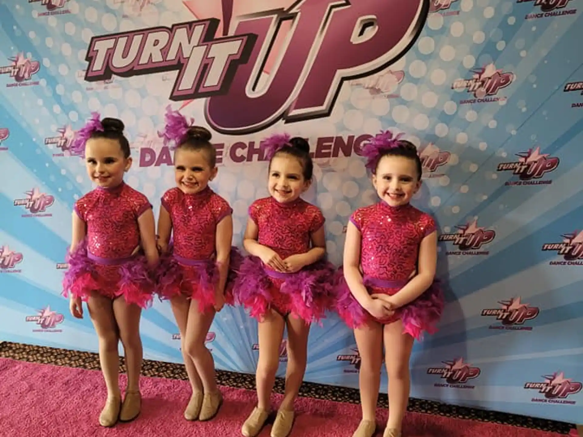 a group of girls in clothing