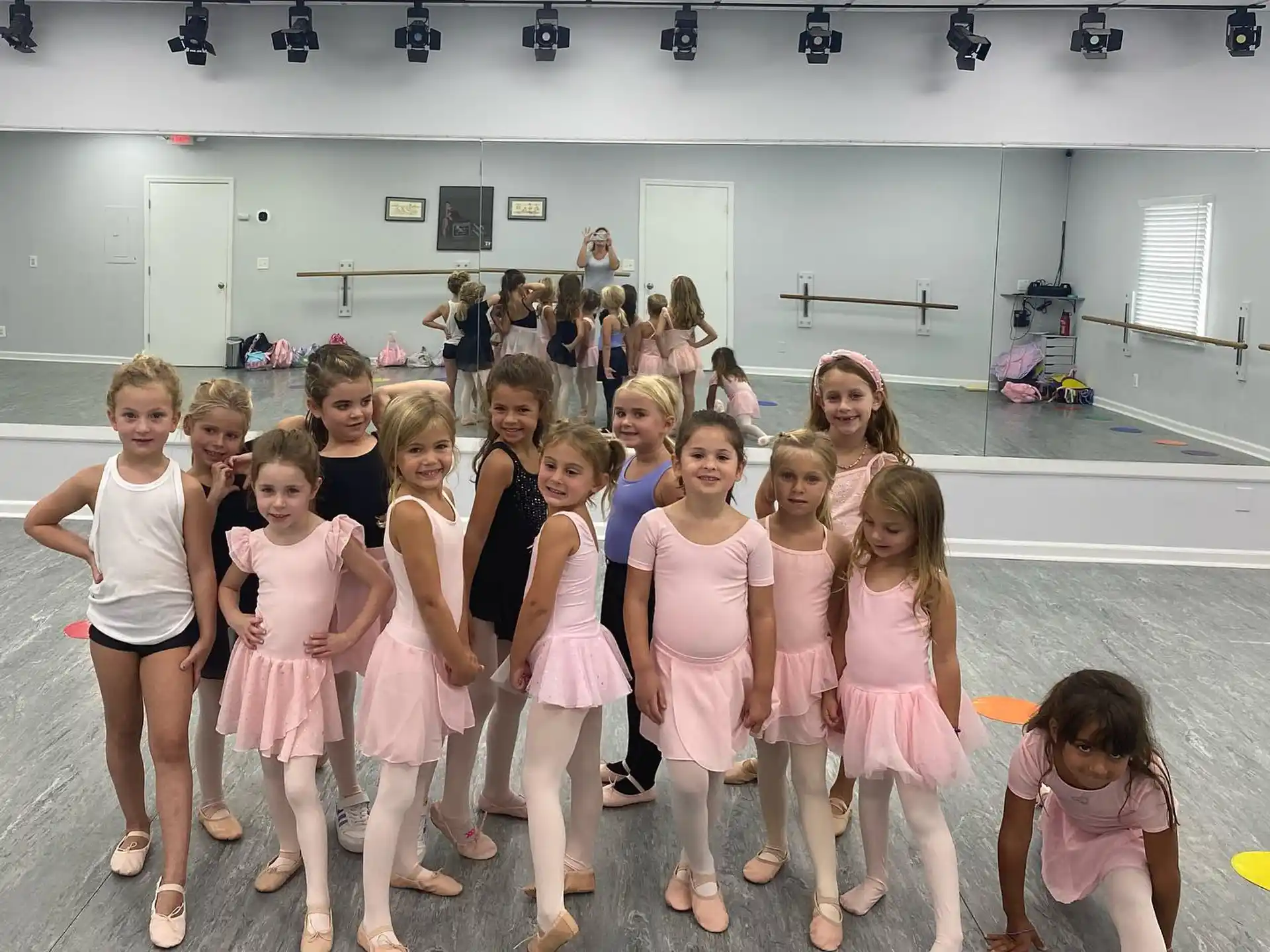 a group of girls posing for a photo
