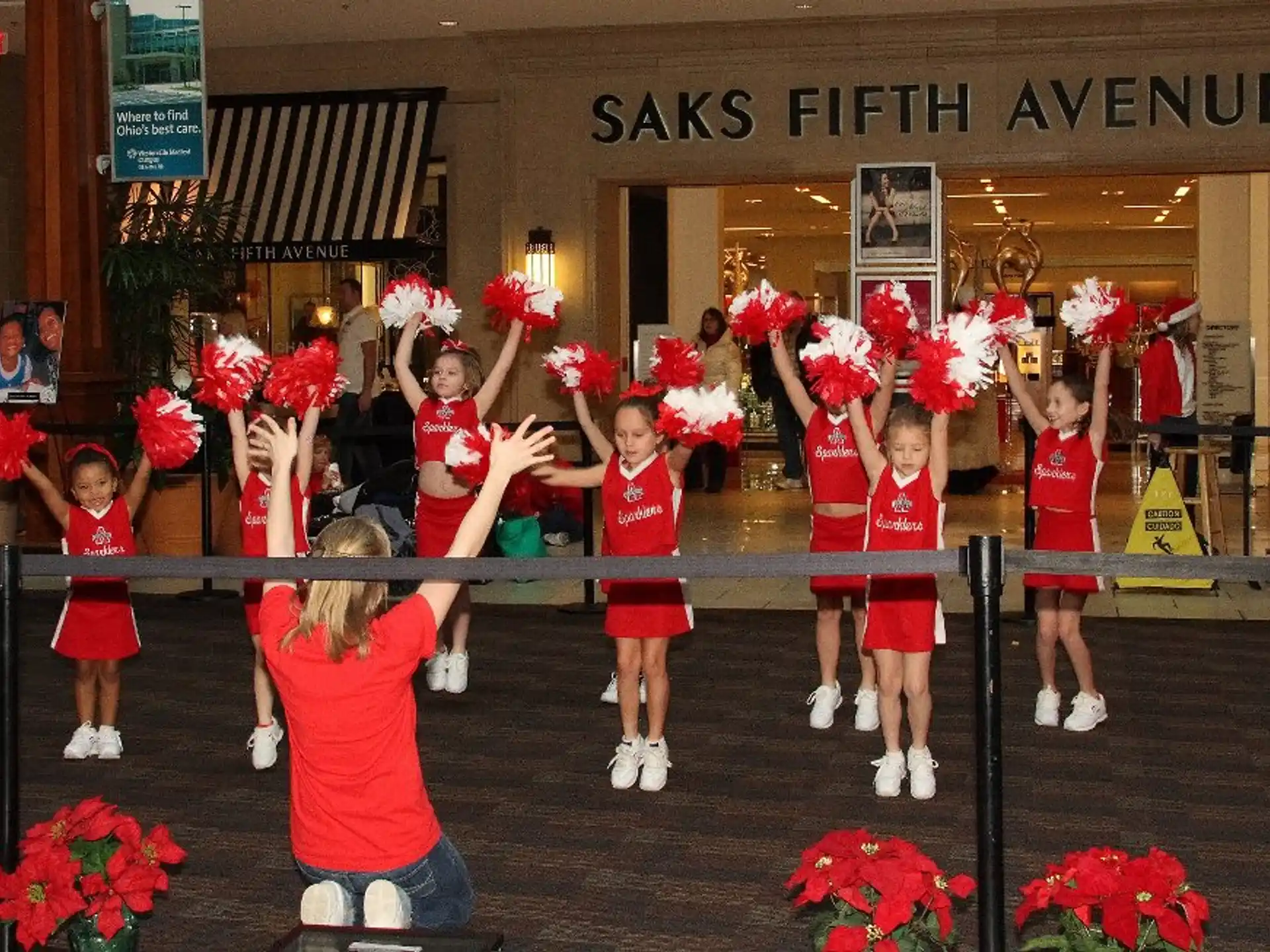a group of girls in red uniforms