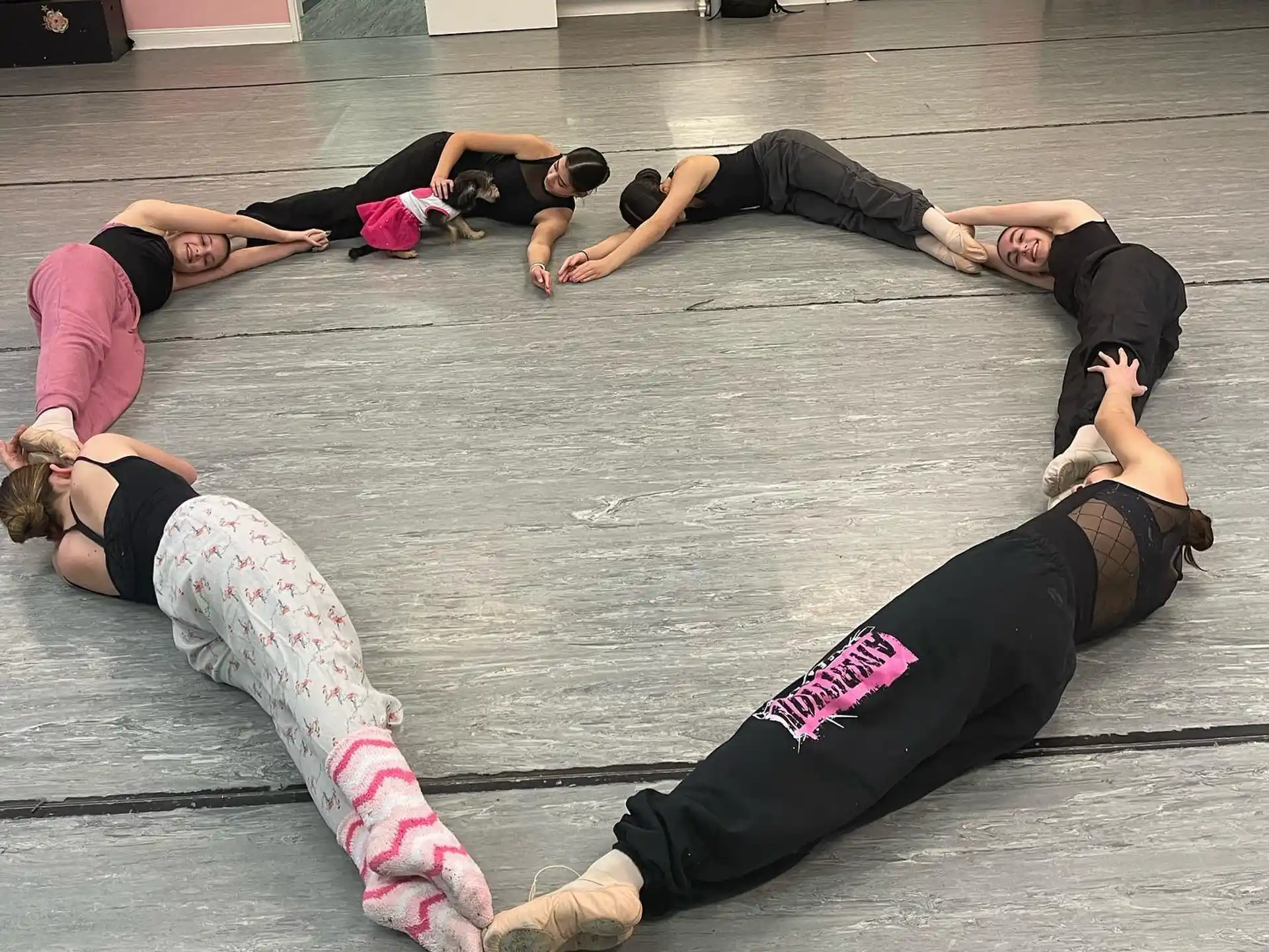 a group of women doing yoga