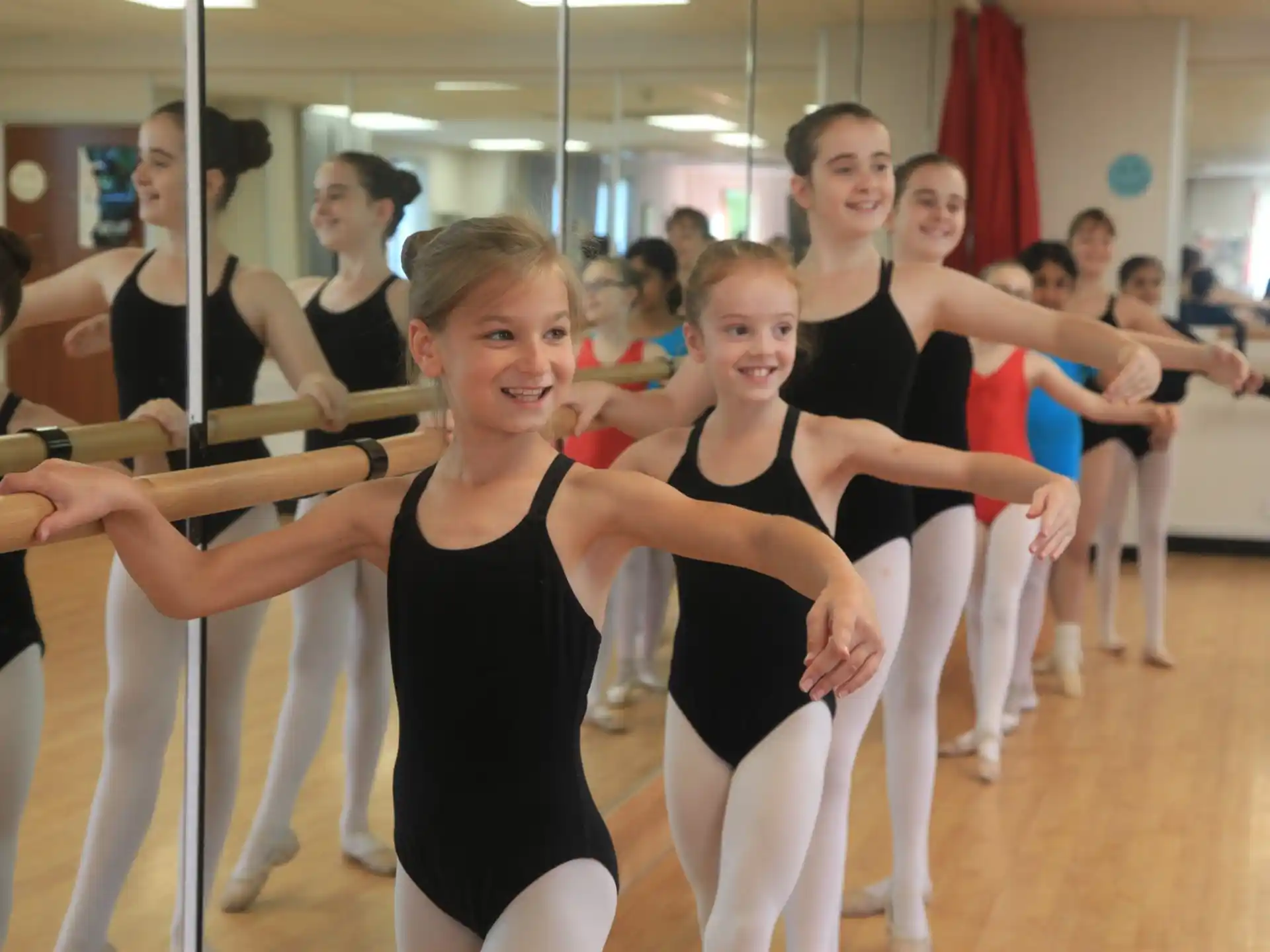a group of girls in a gym