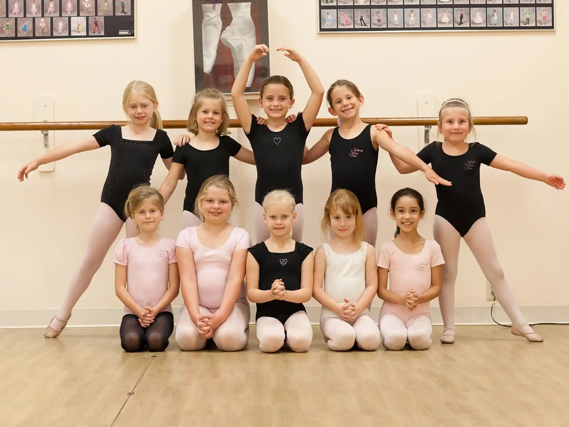 a group of girls posing for a photo