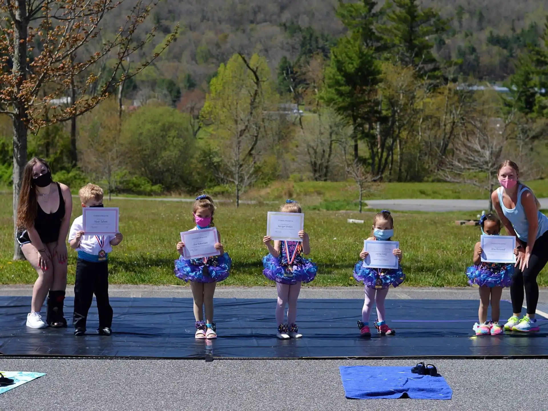 a group of people holding signs
