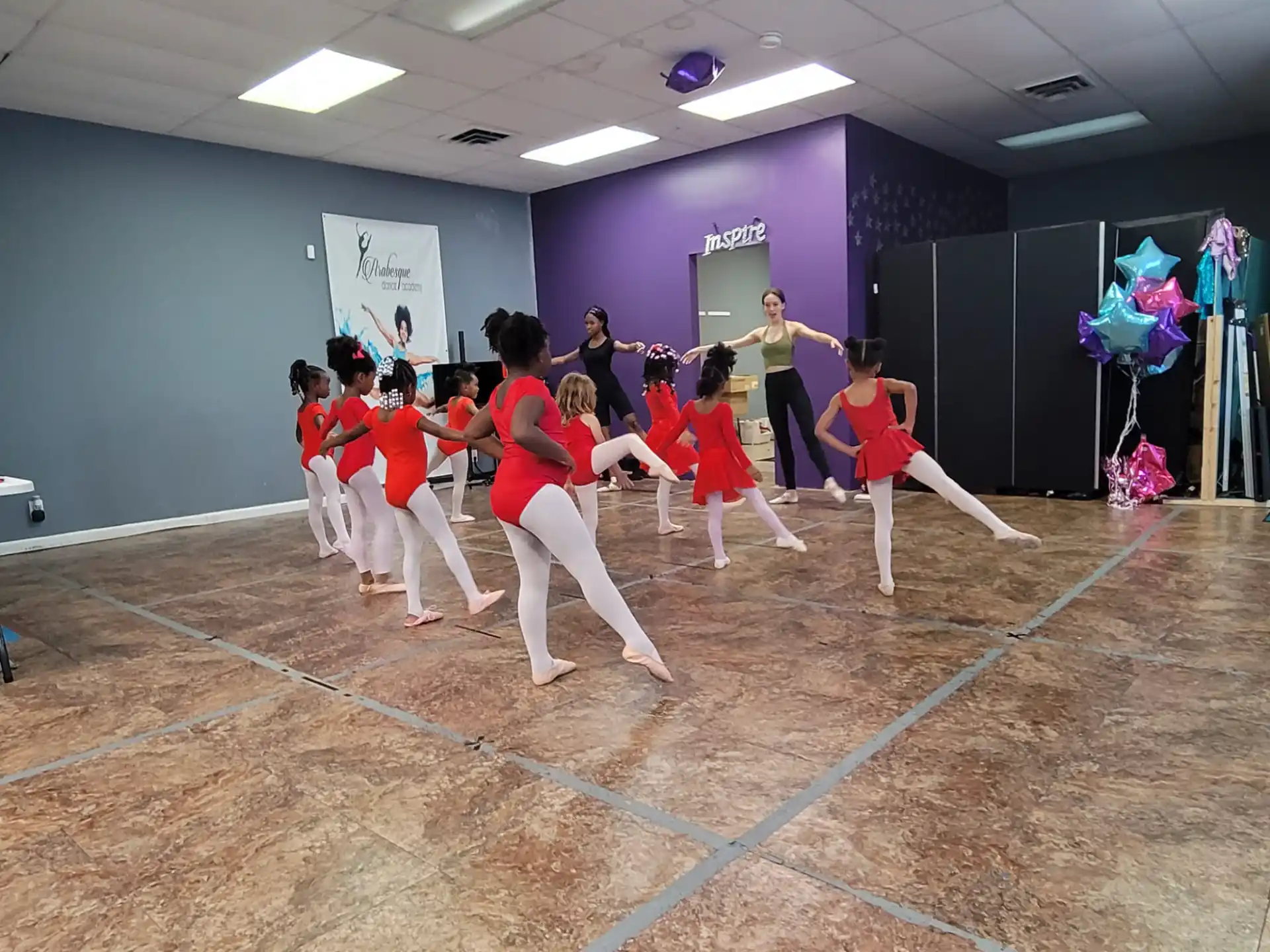a group of people in a gym