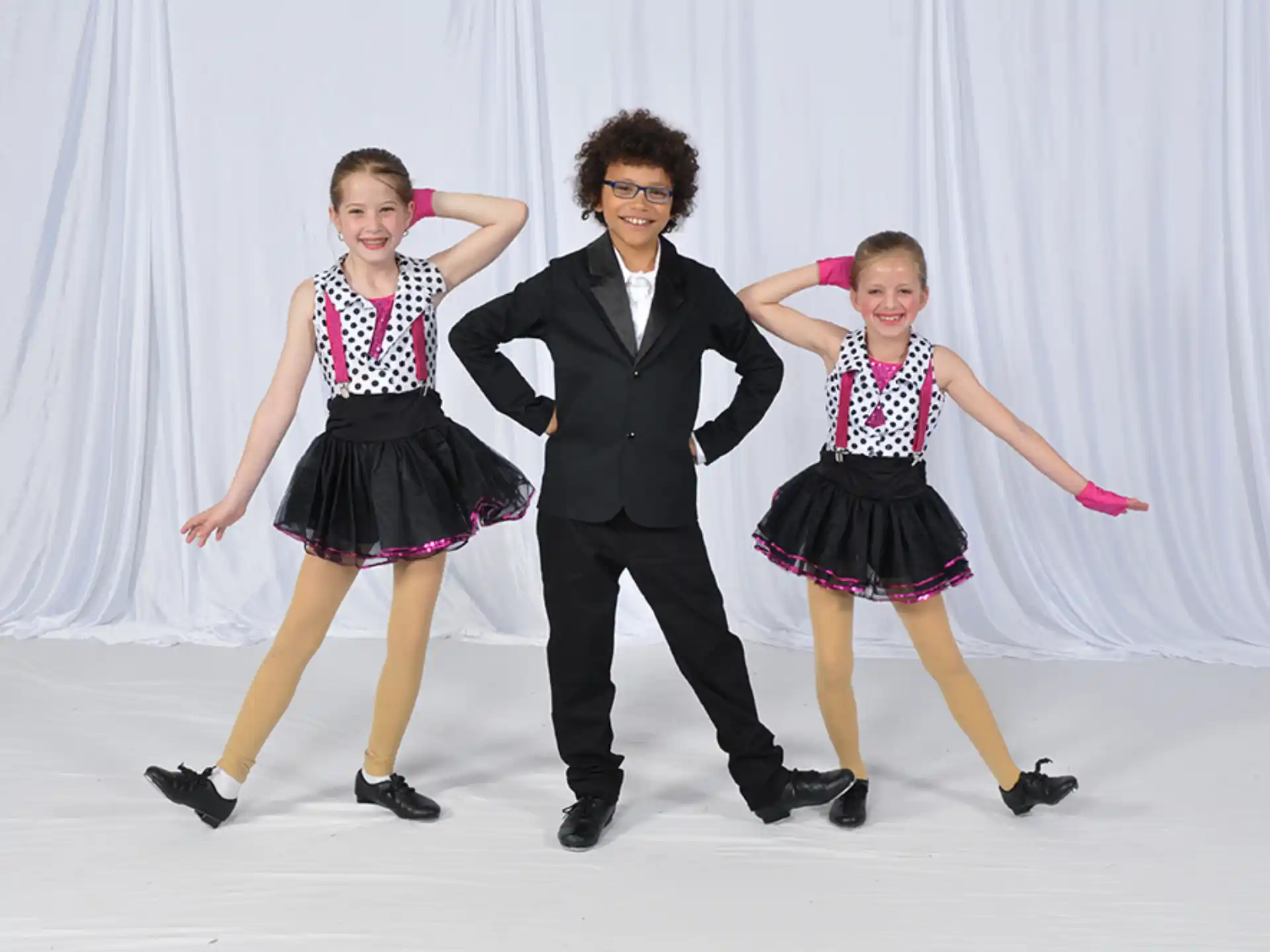 a person and two women dancing