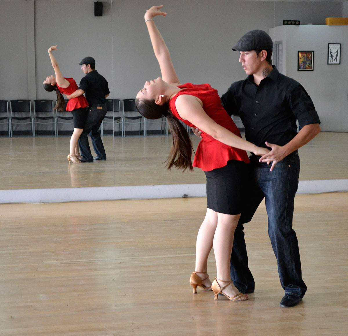 a man and woman dancing