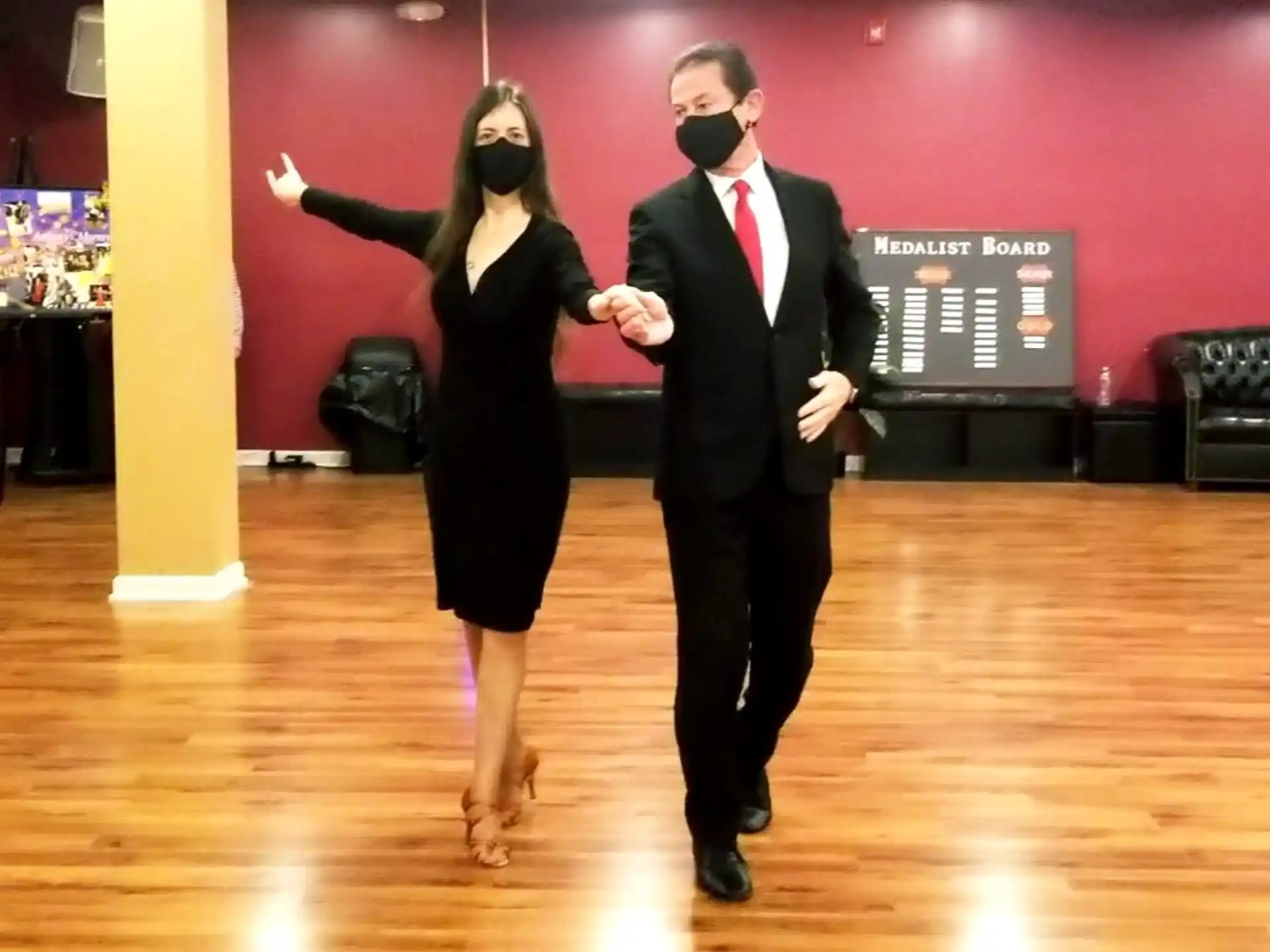 a man and woman dancing