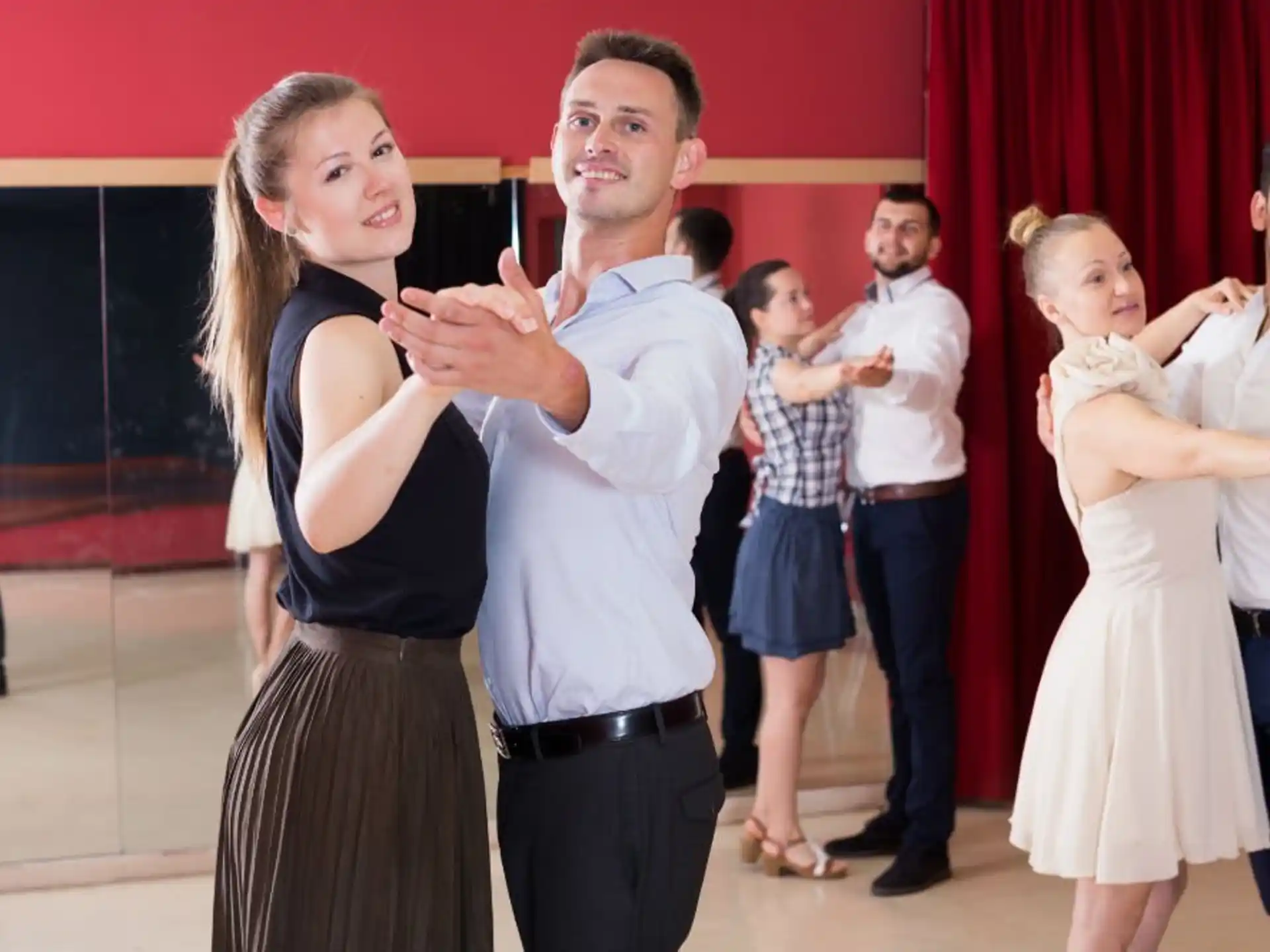 a man and woman dancing