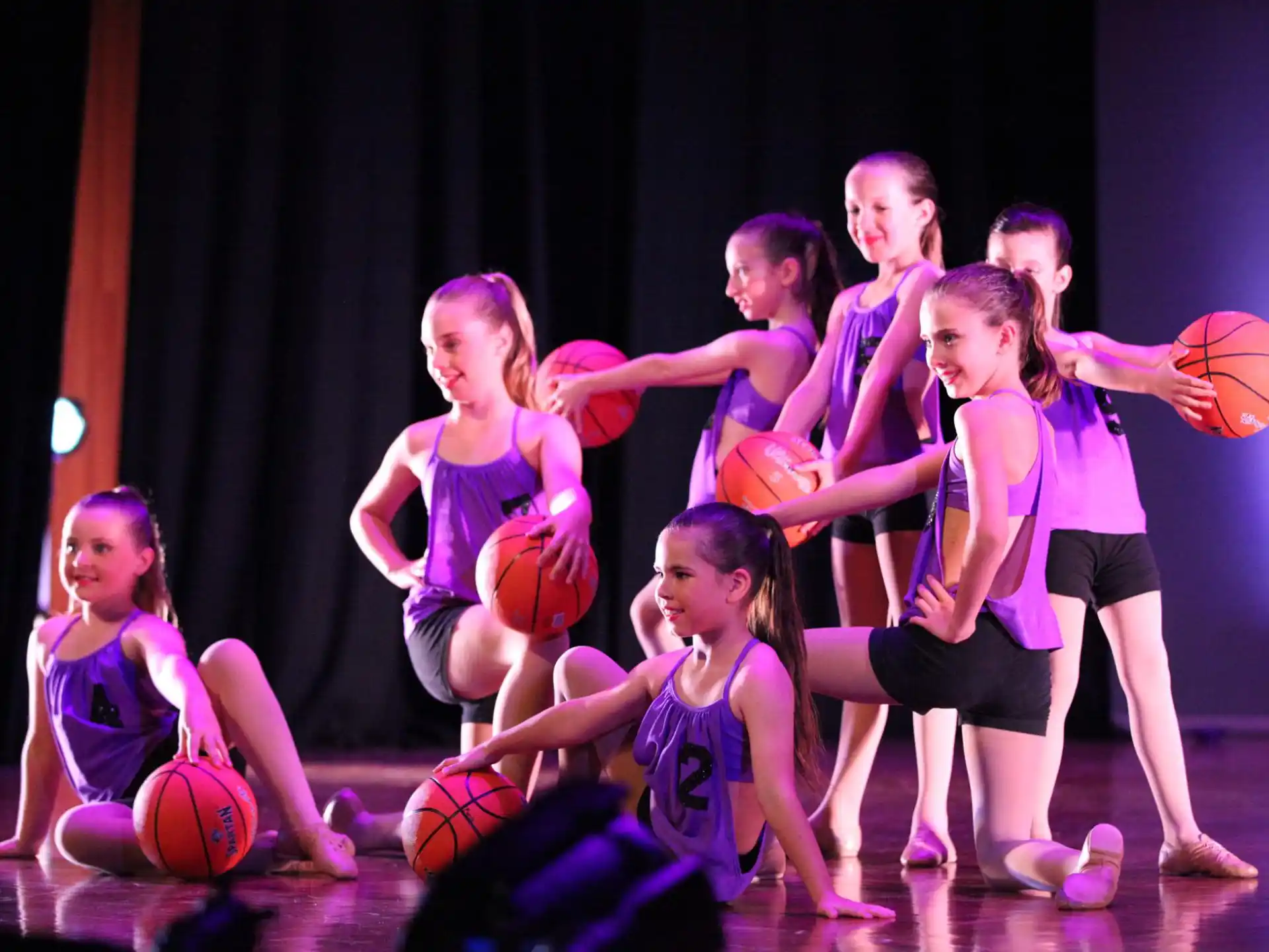 a group of girls in a gym