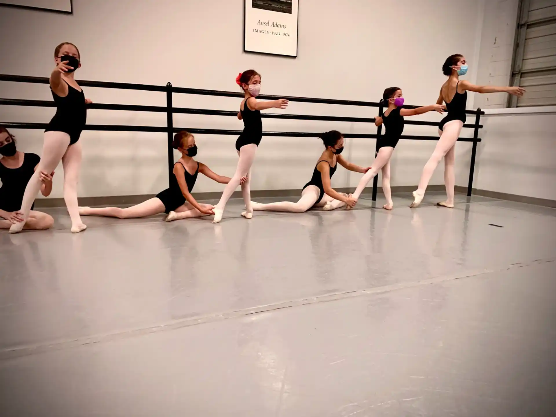 a group of women dancing on a stage